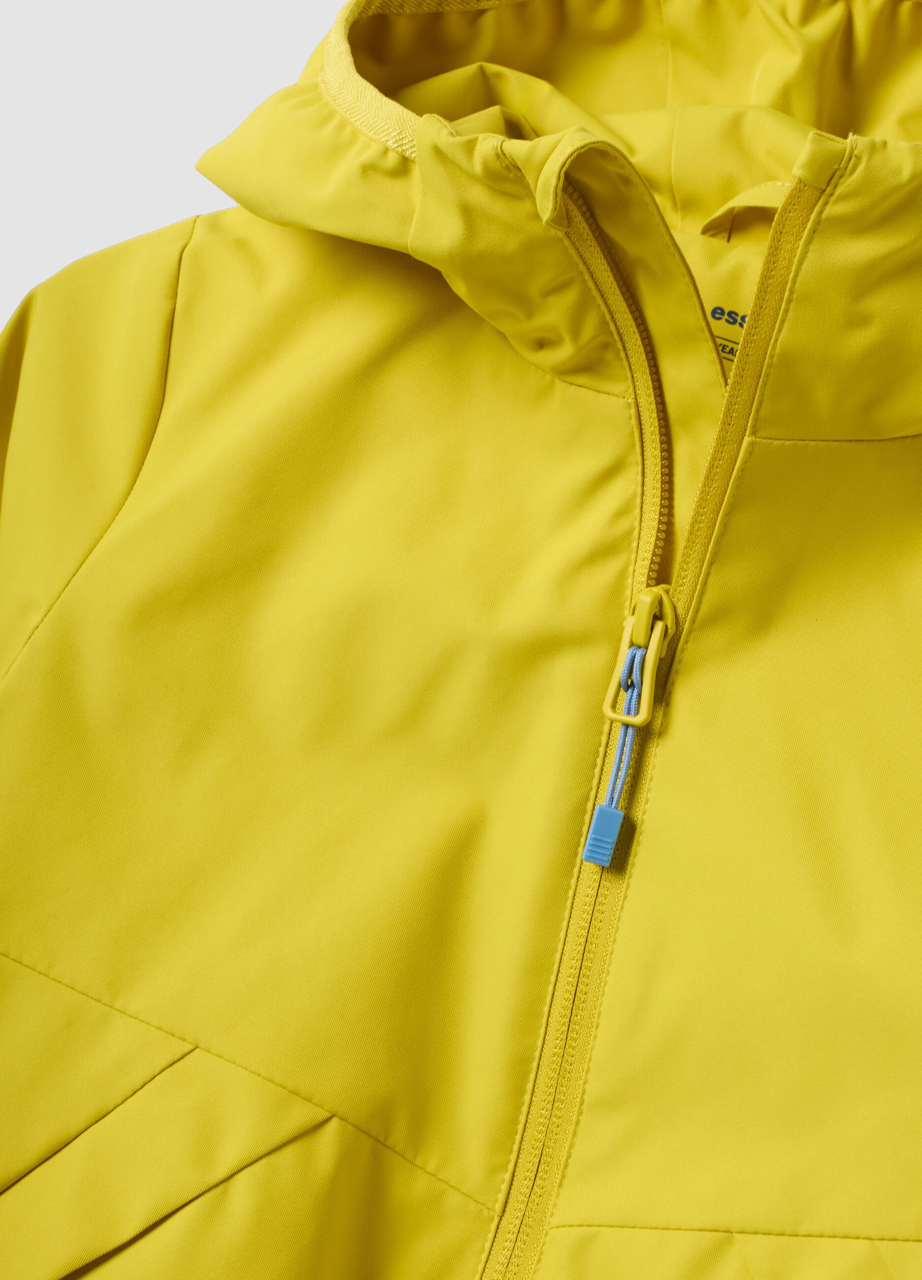 Yellow rain jacket with hood and zip, oversized fit for boys