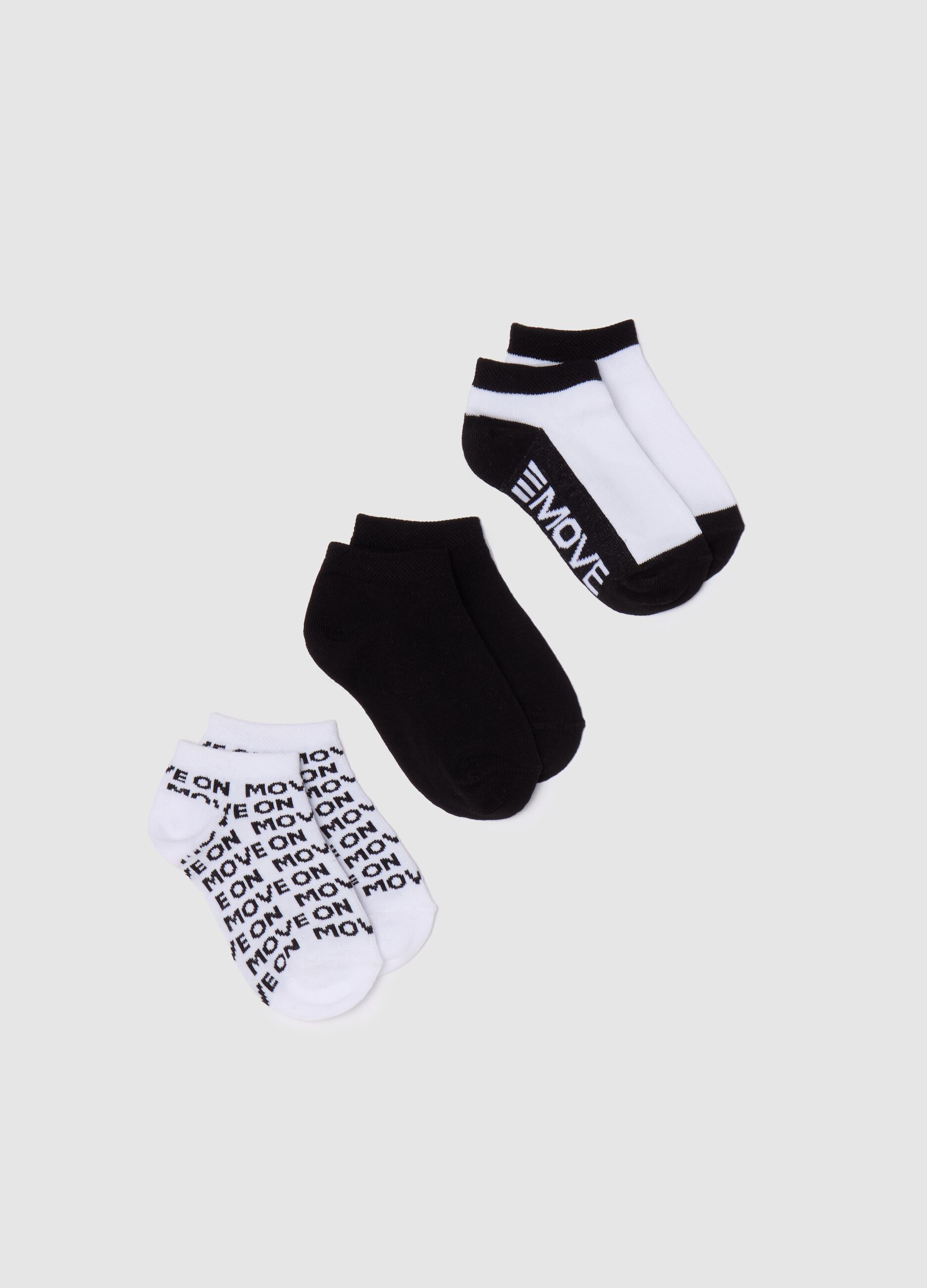 Three-pair pack stretch shoe liners with "Move On" lettering