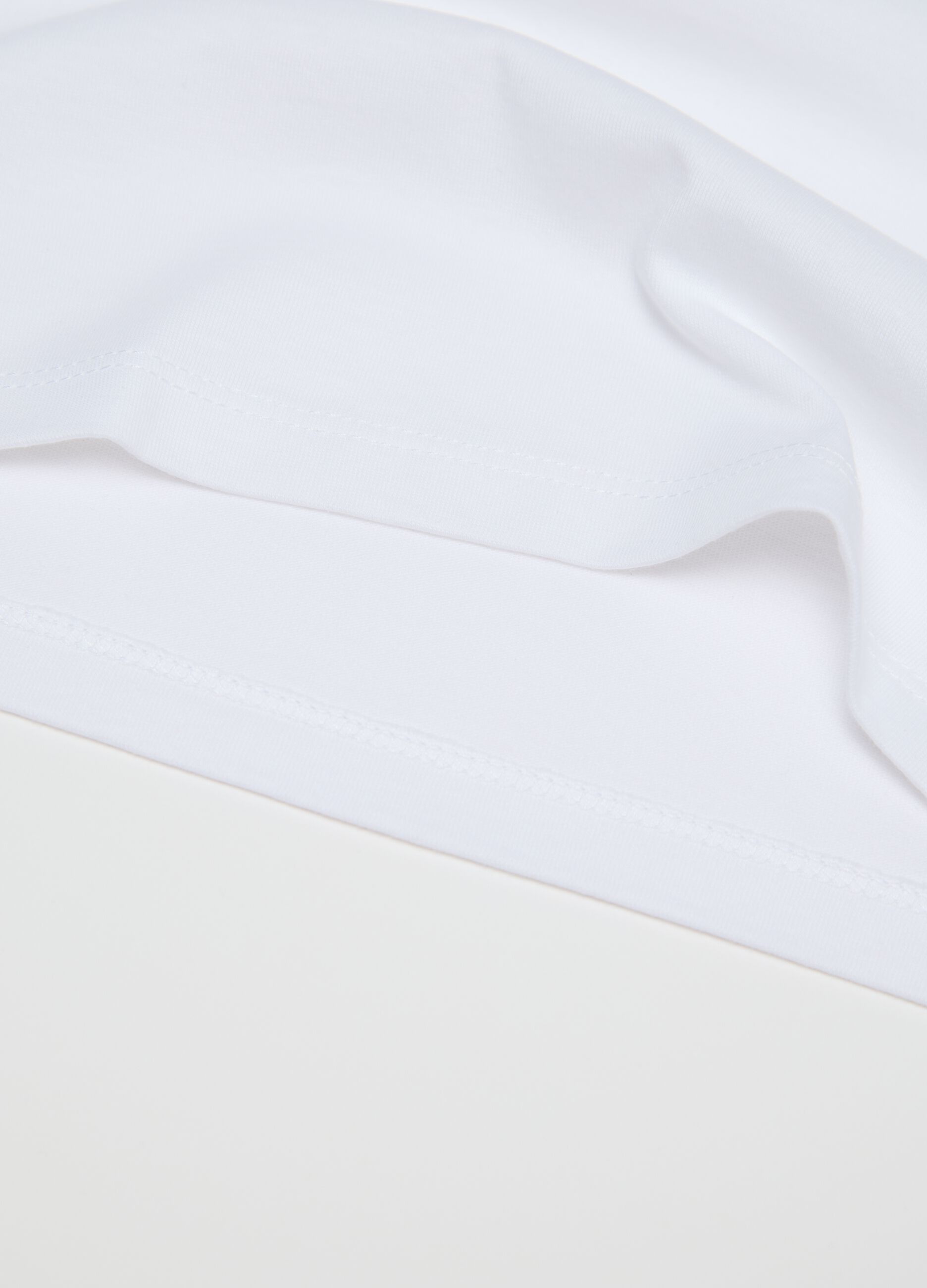 Two-pack white and blue racerback vests in organic cotton