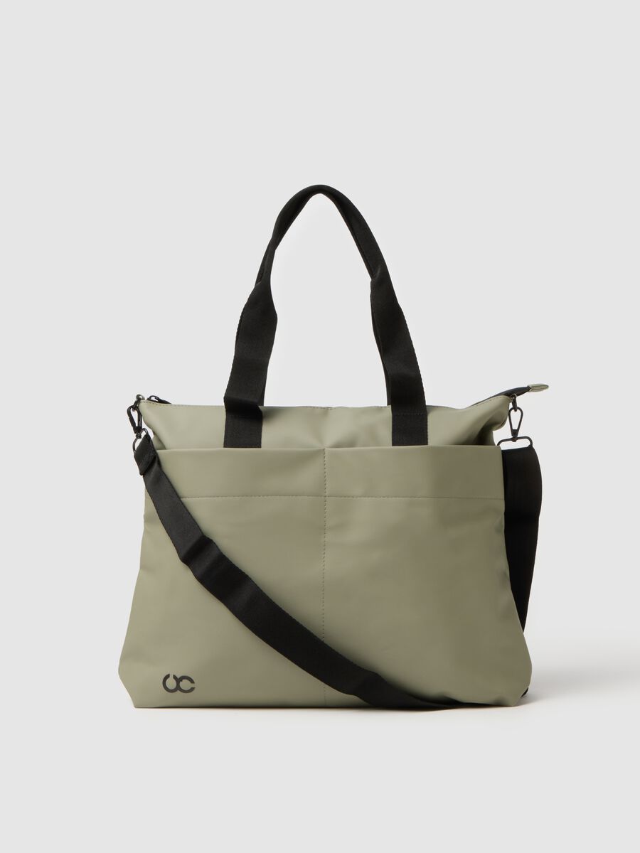 Green tote bag with multiple compartments and adjustable shoulder strap_0