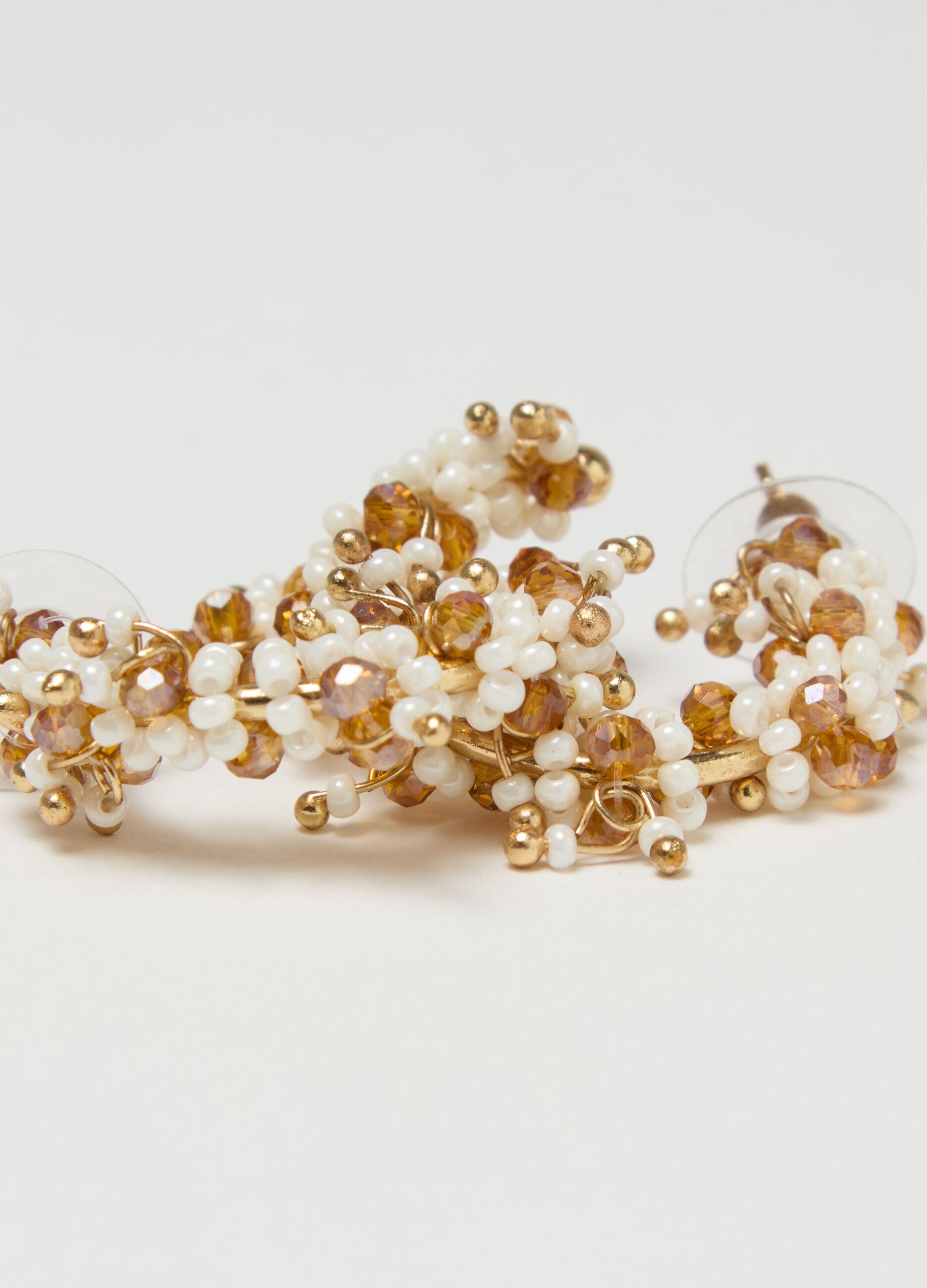 Semi-circular earrings with beads