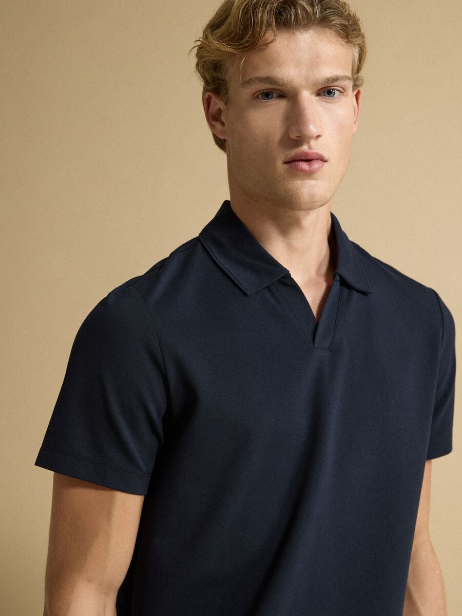 Polo blu in cotone elasticizzato 2 Way Stretch regular fit_0