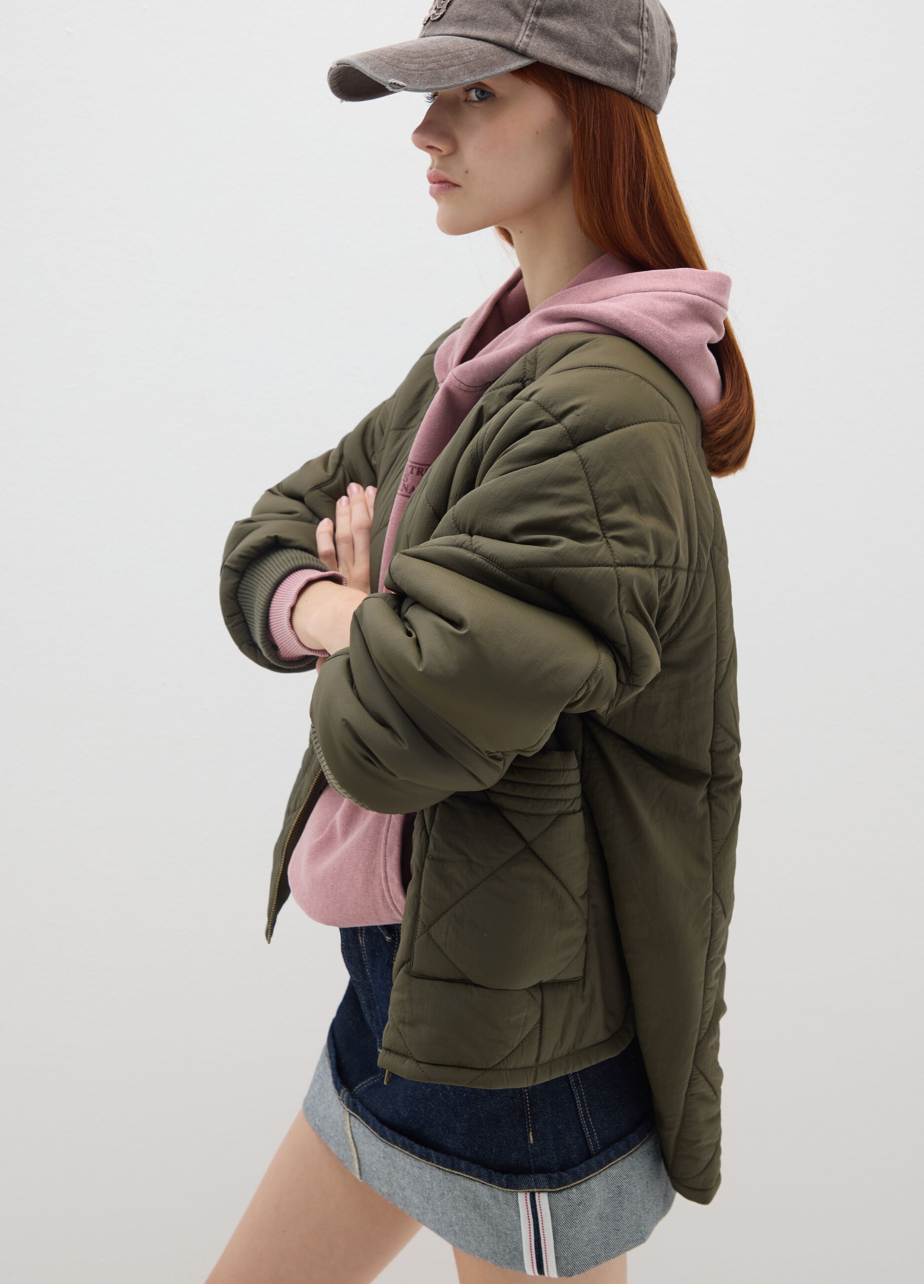 Green padded jacket with oversized fit