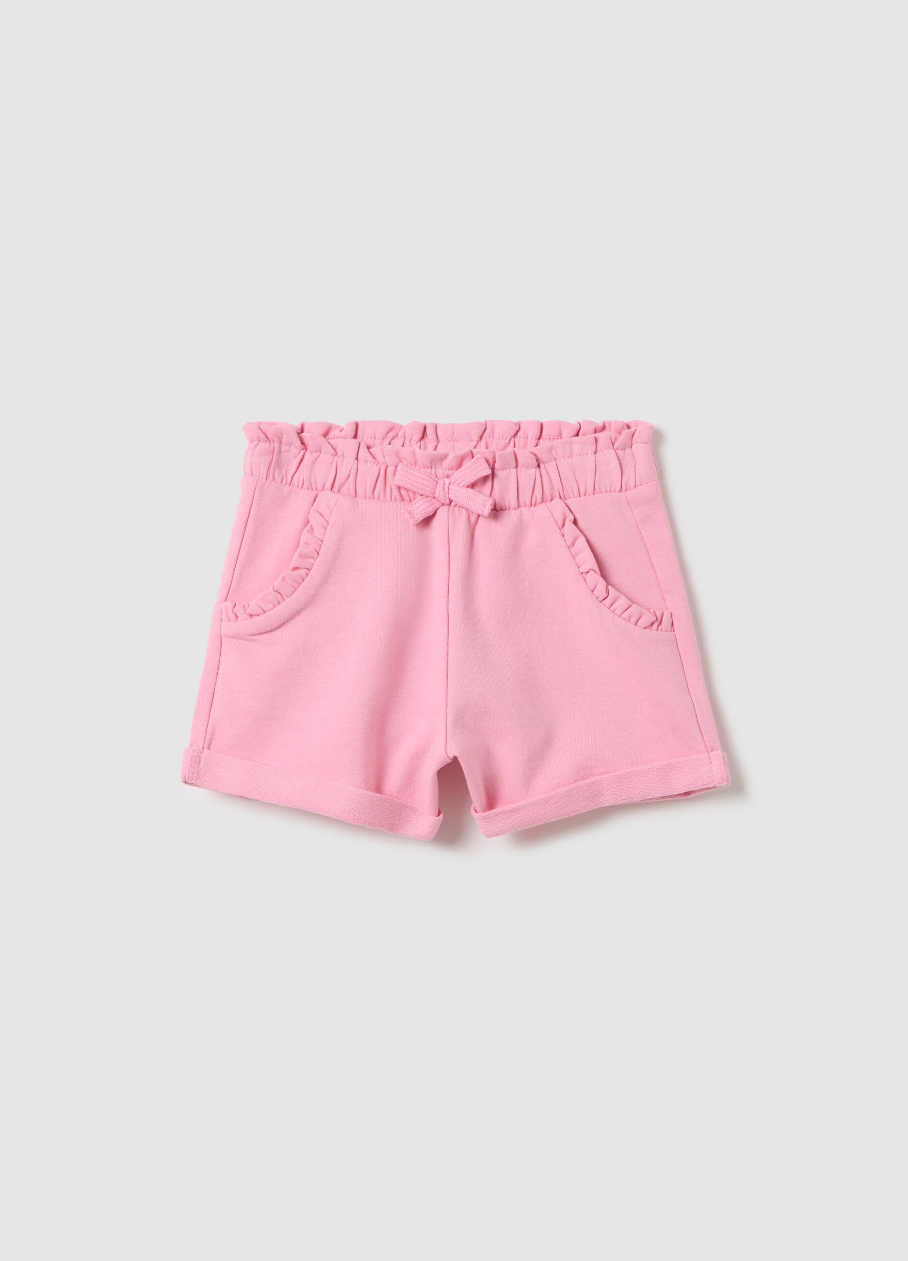 Pink French terry shorts with bow and frills