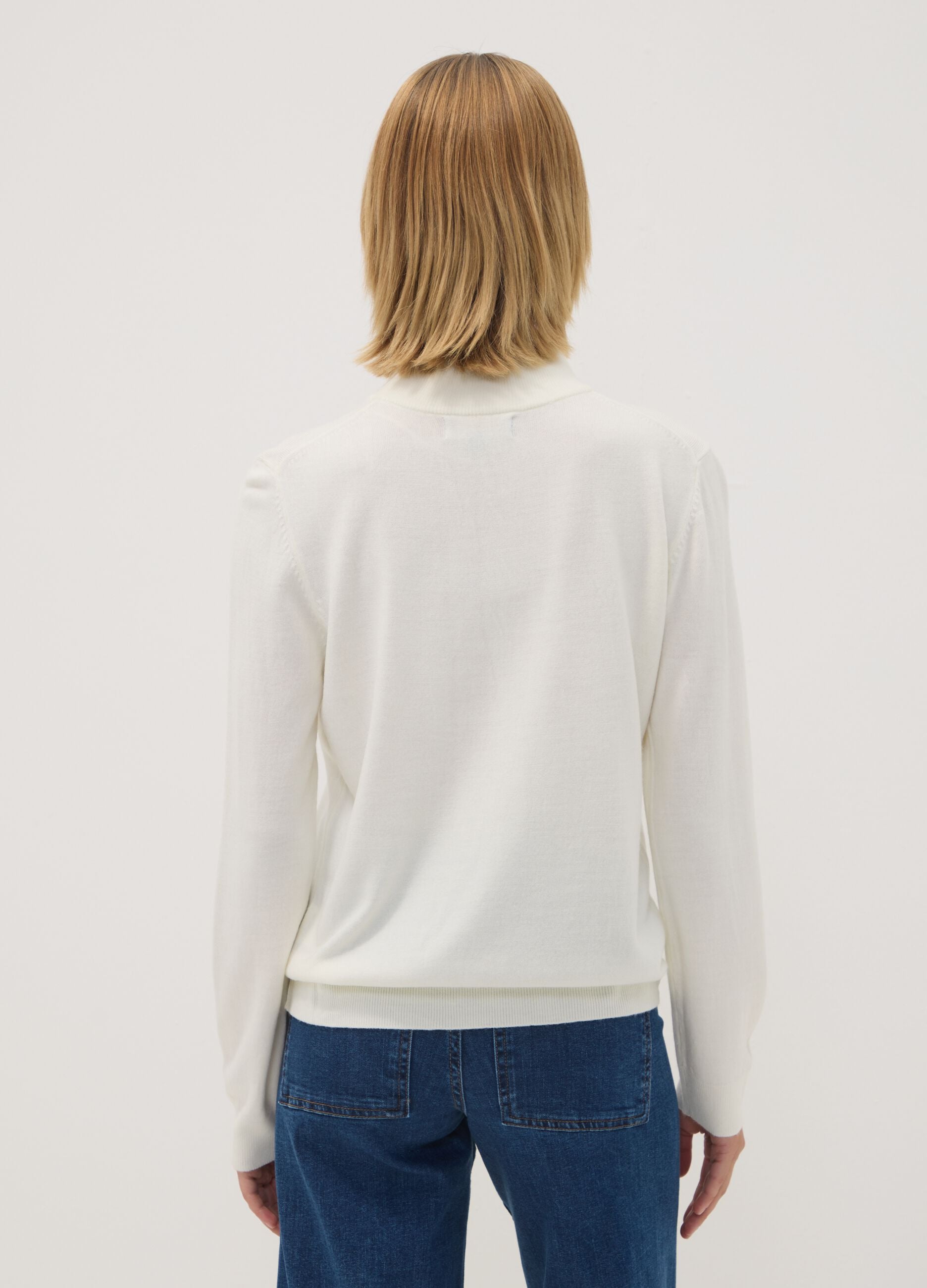 White long-sleeved top with high neck, regular fit