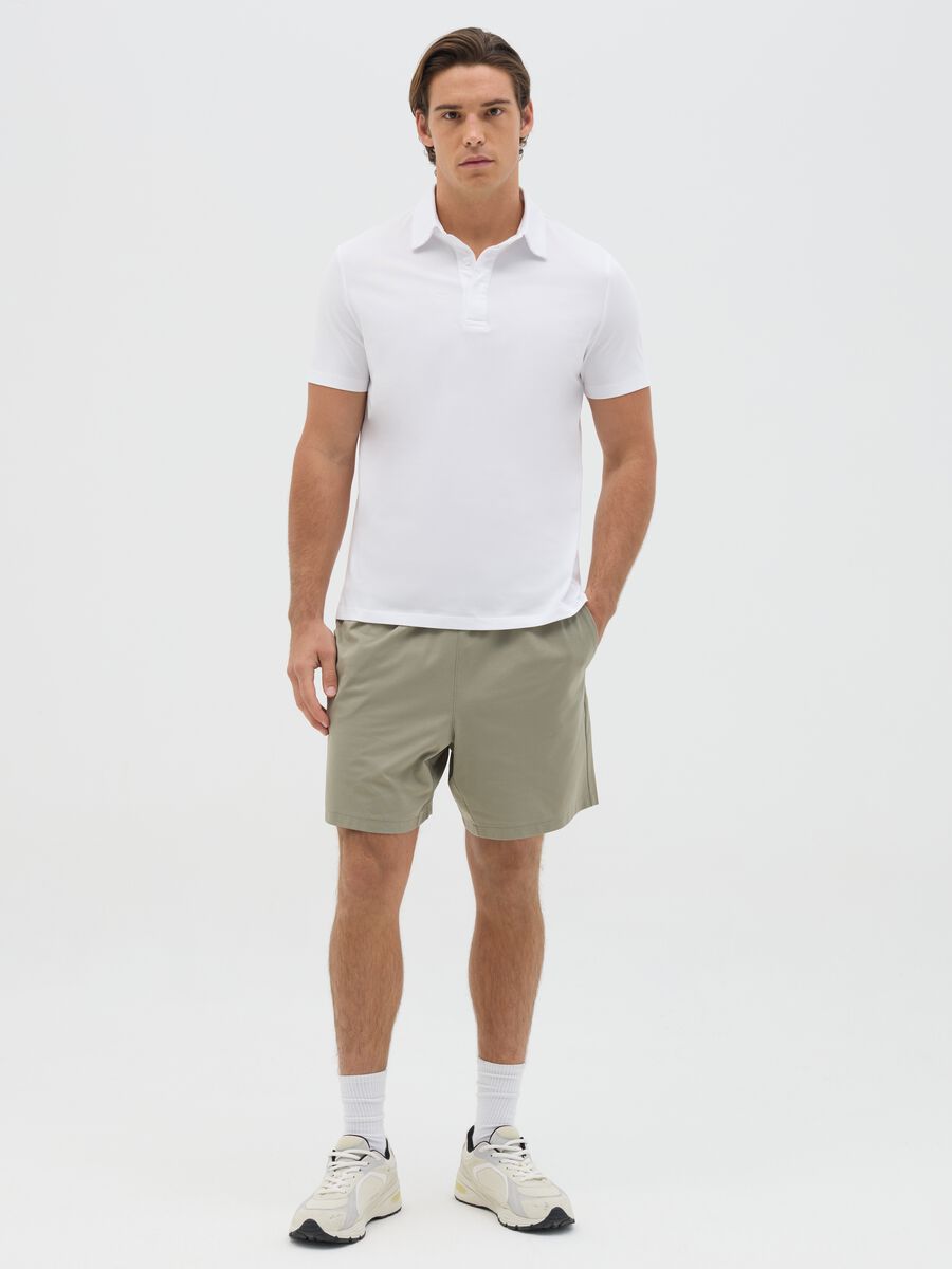 Green Bermuda joggers in stretch fabric_0