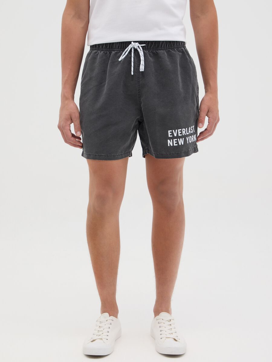 Grey swimming trunks with logo print_1