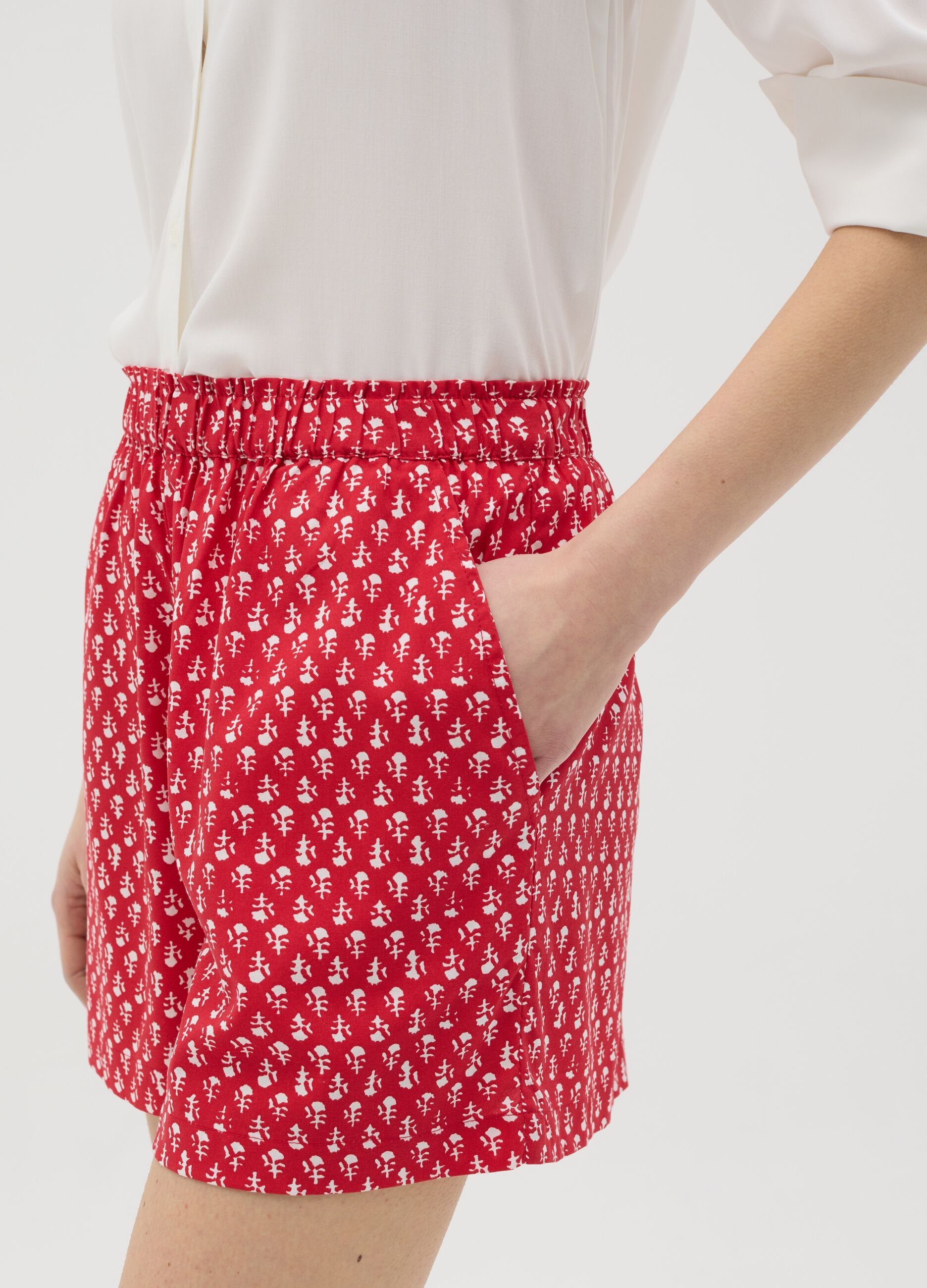 Red viscose shorts with ethnic pattern