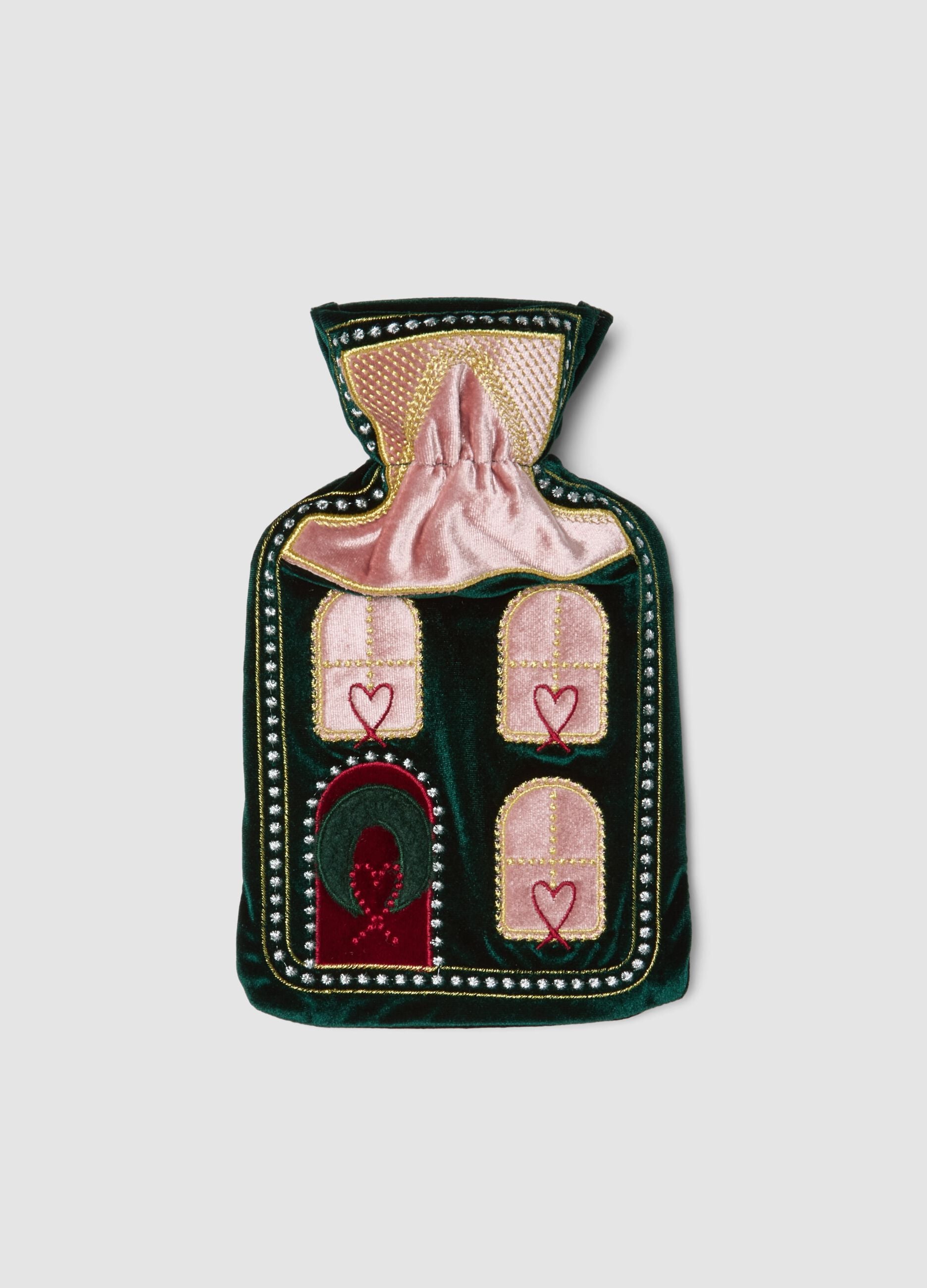 Green and pink hot water bottle with decorative embroidery