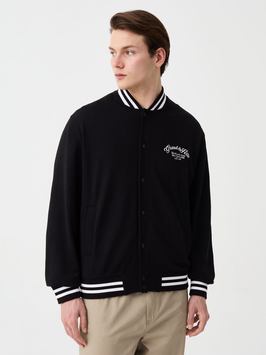 Varsity bomber jacket in fleece with embroidery_0