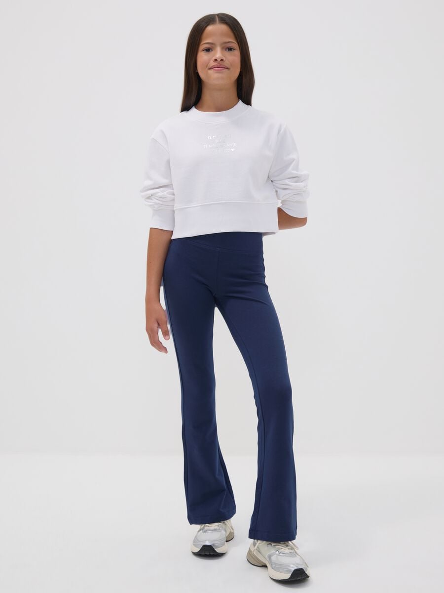 Girls&rsquo; blue flared trousers in stretch organic cotton_1