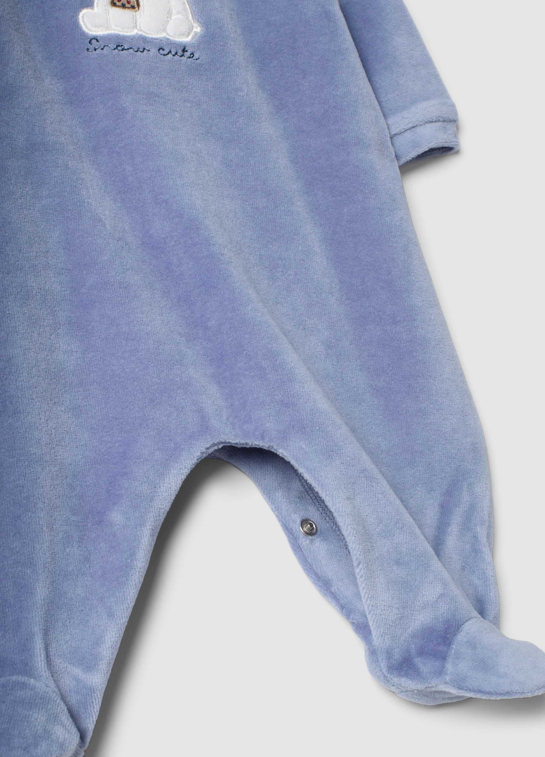 Tutina azzurra in misto cotone organico con colletto