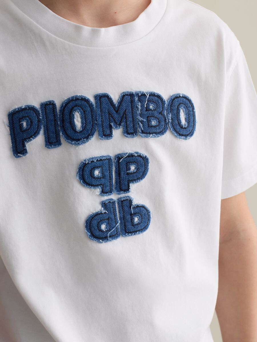 Cotton T-shirt with appliqué logo in denim_1