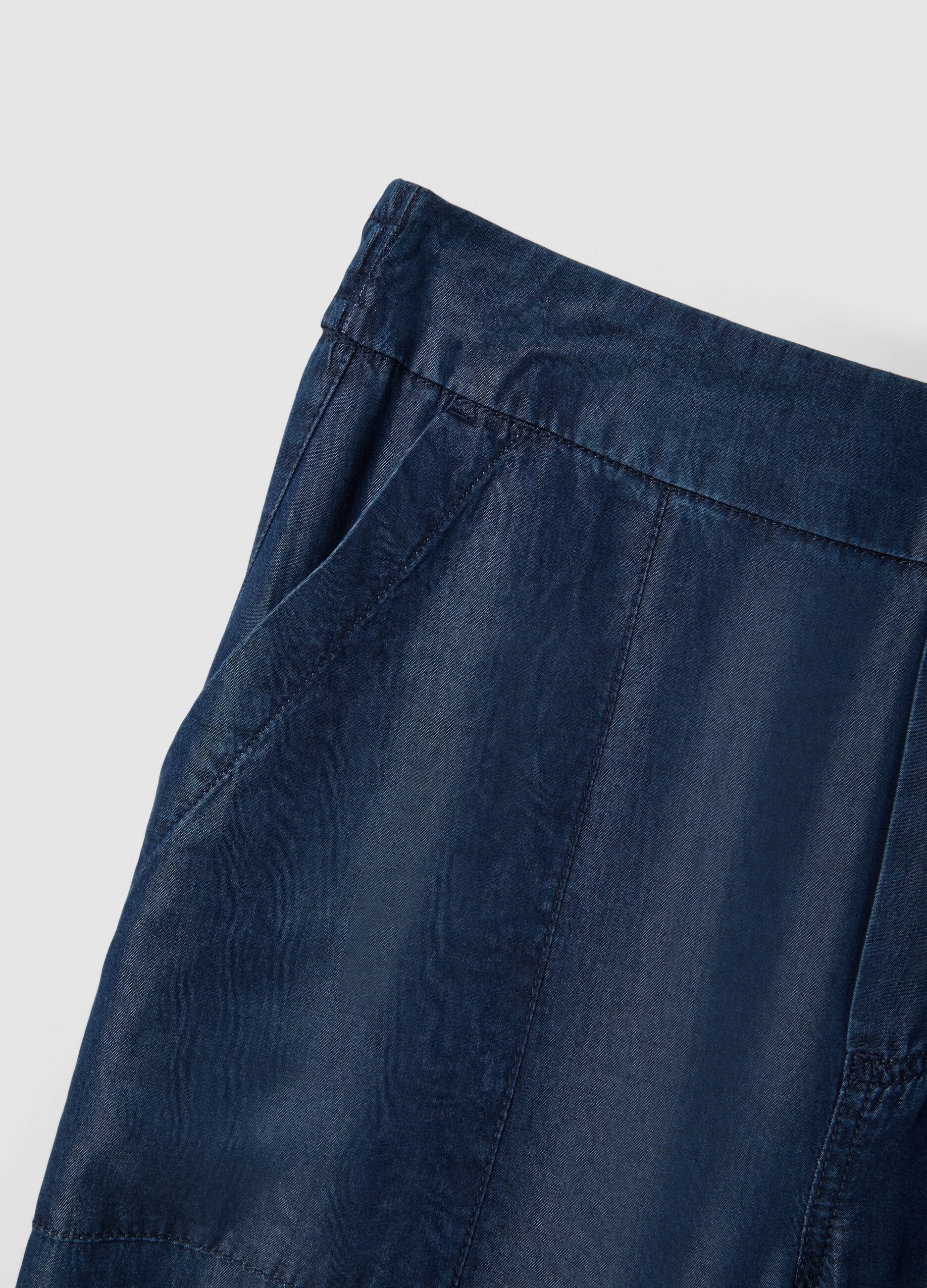 Blue denim jeans in 100% lyocell with elasticated waist, relaxed fit