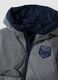 Long grey padded jacket with hood and zip_3