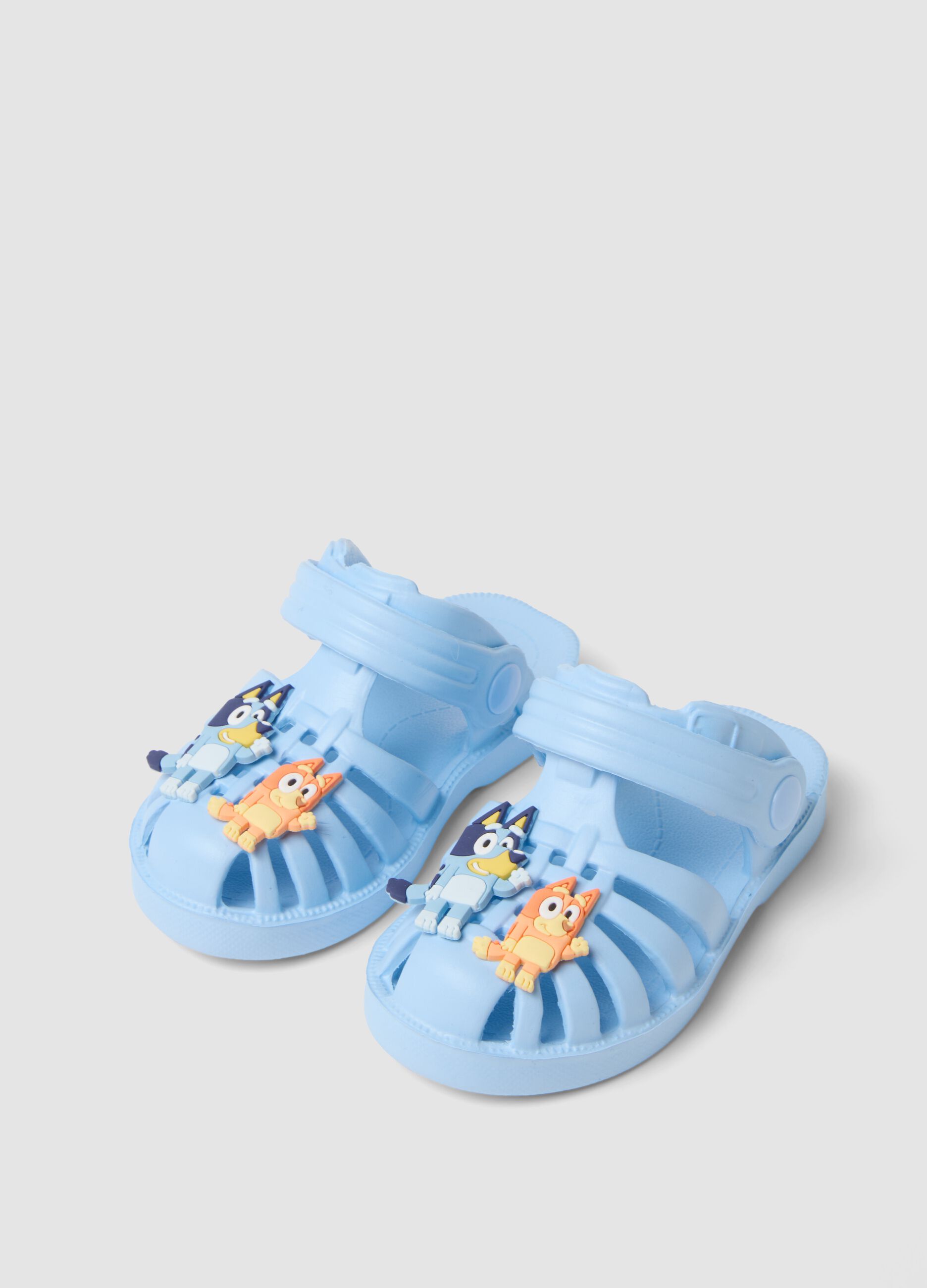 Baby blue sandals with decorative appliqu&eacute;s