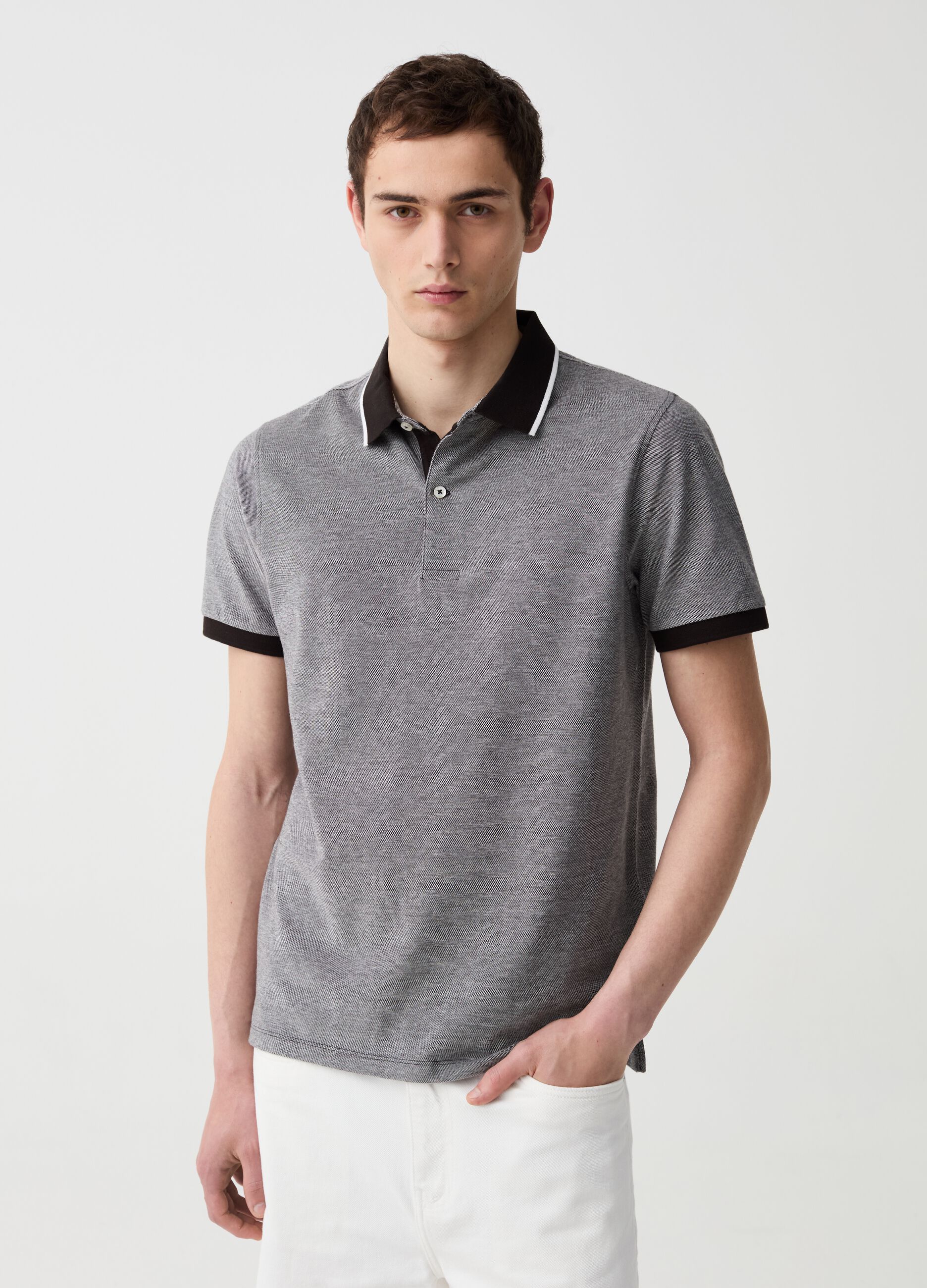 Polo in piquet con trama jacquard