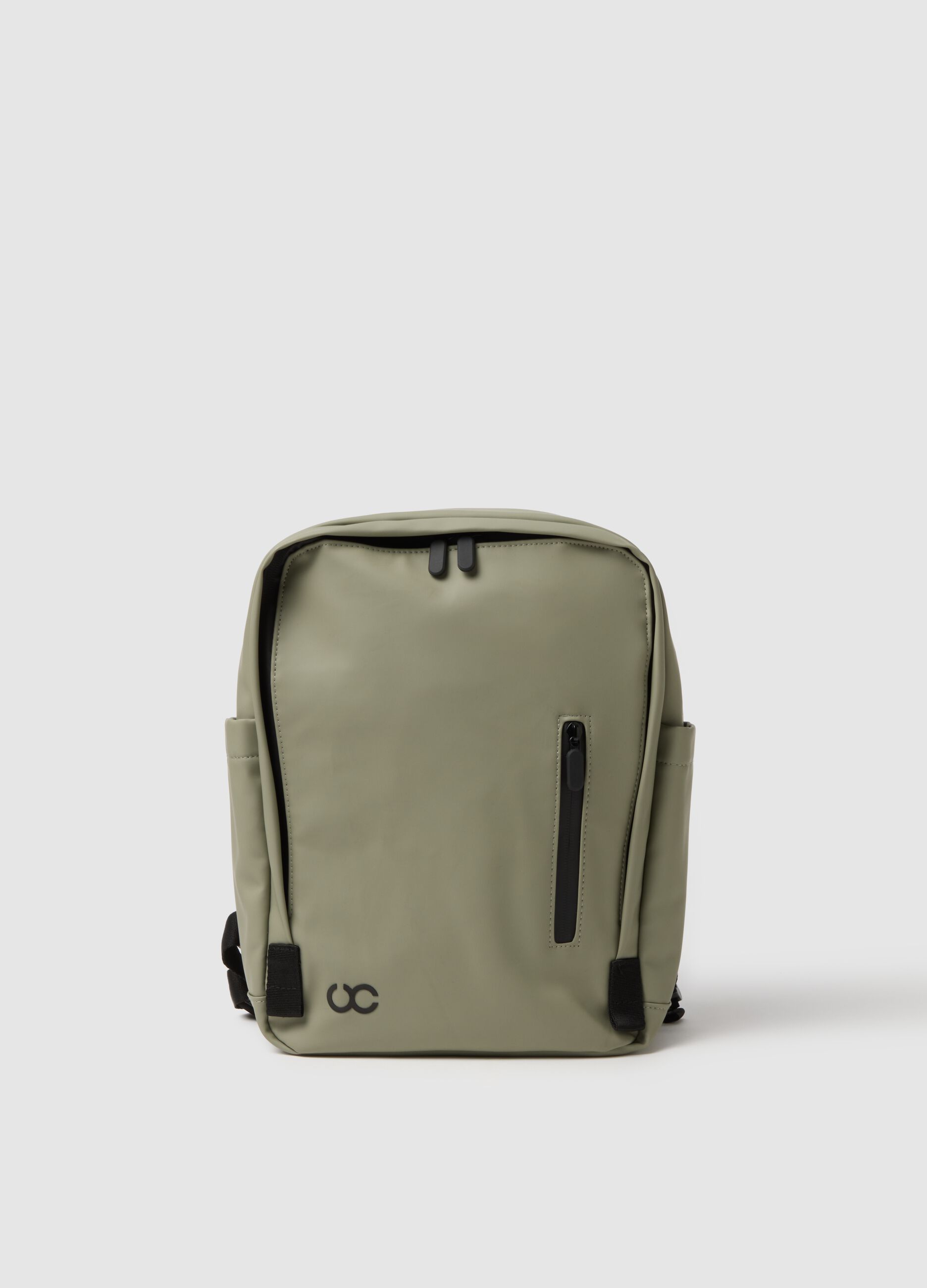 Green backpack with adjustable straps and multiple pockets