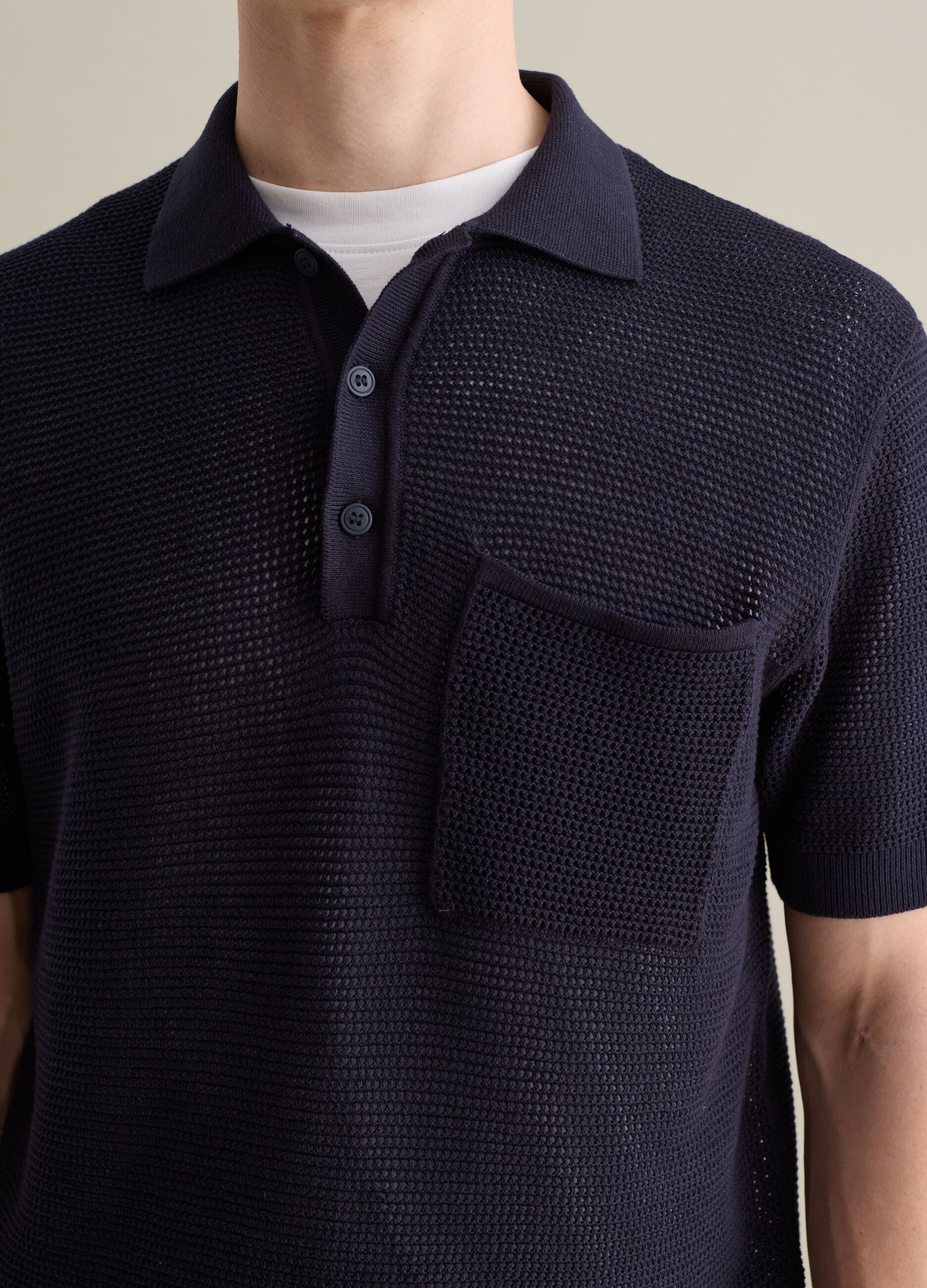 Blue polo shirt in openwork knit