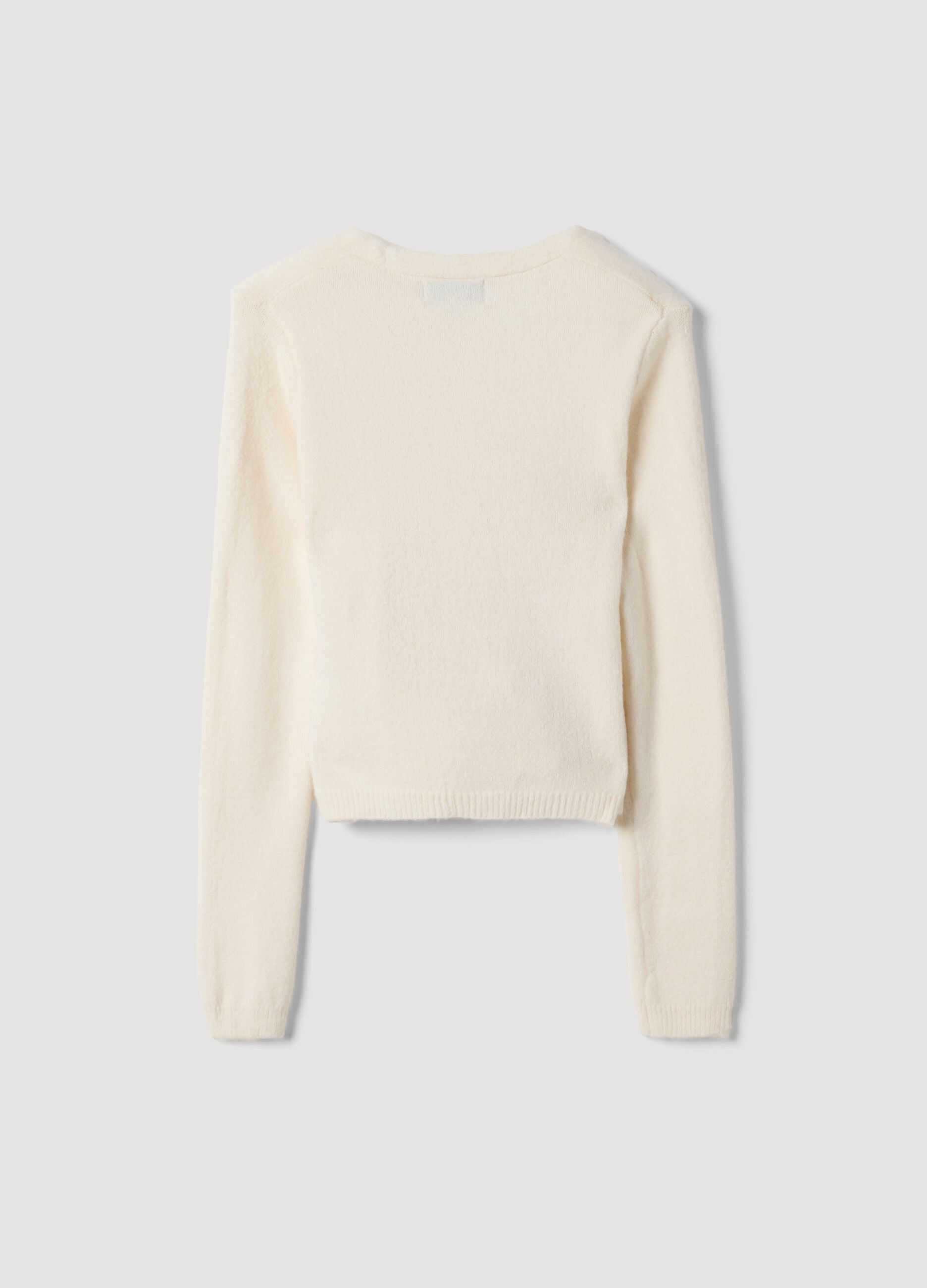 White wrap cardigan with deep V-neckline