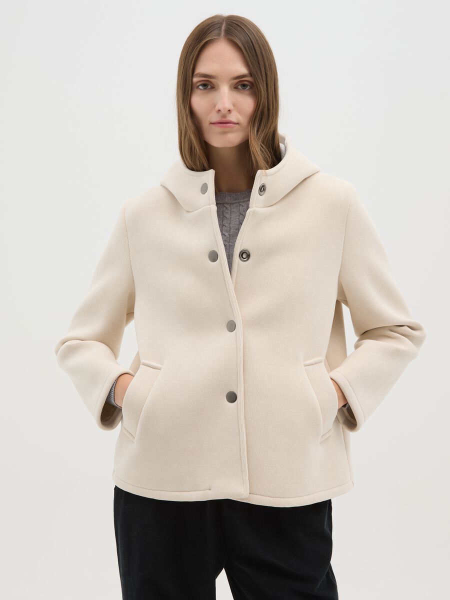 Giacca beige in tessuto a costine con cappuccio_0