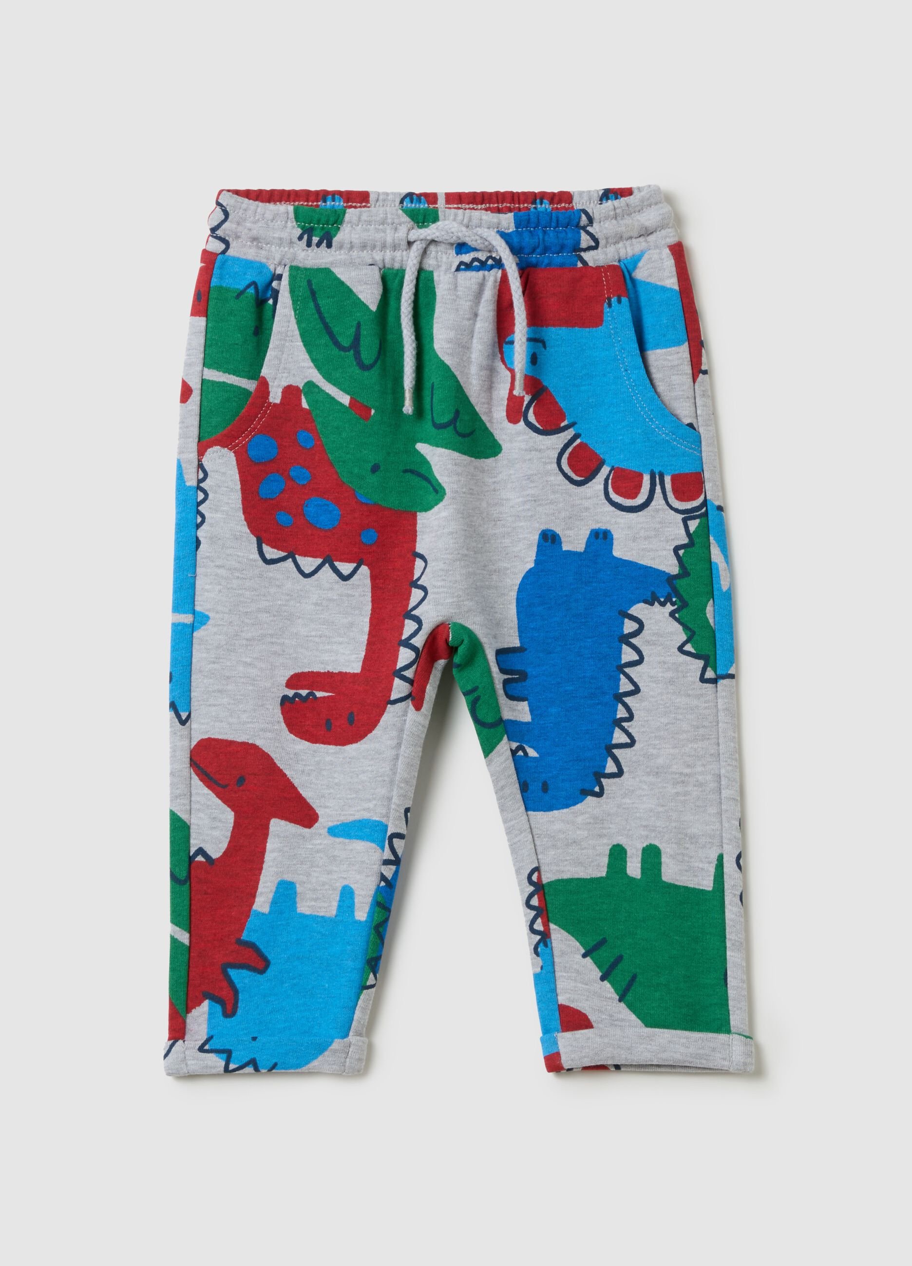 Joggers with all-over dinosaurs print