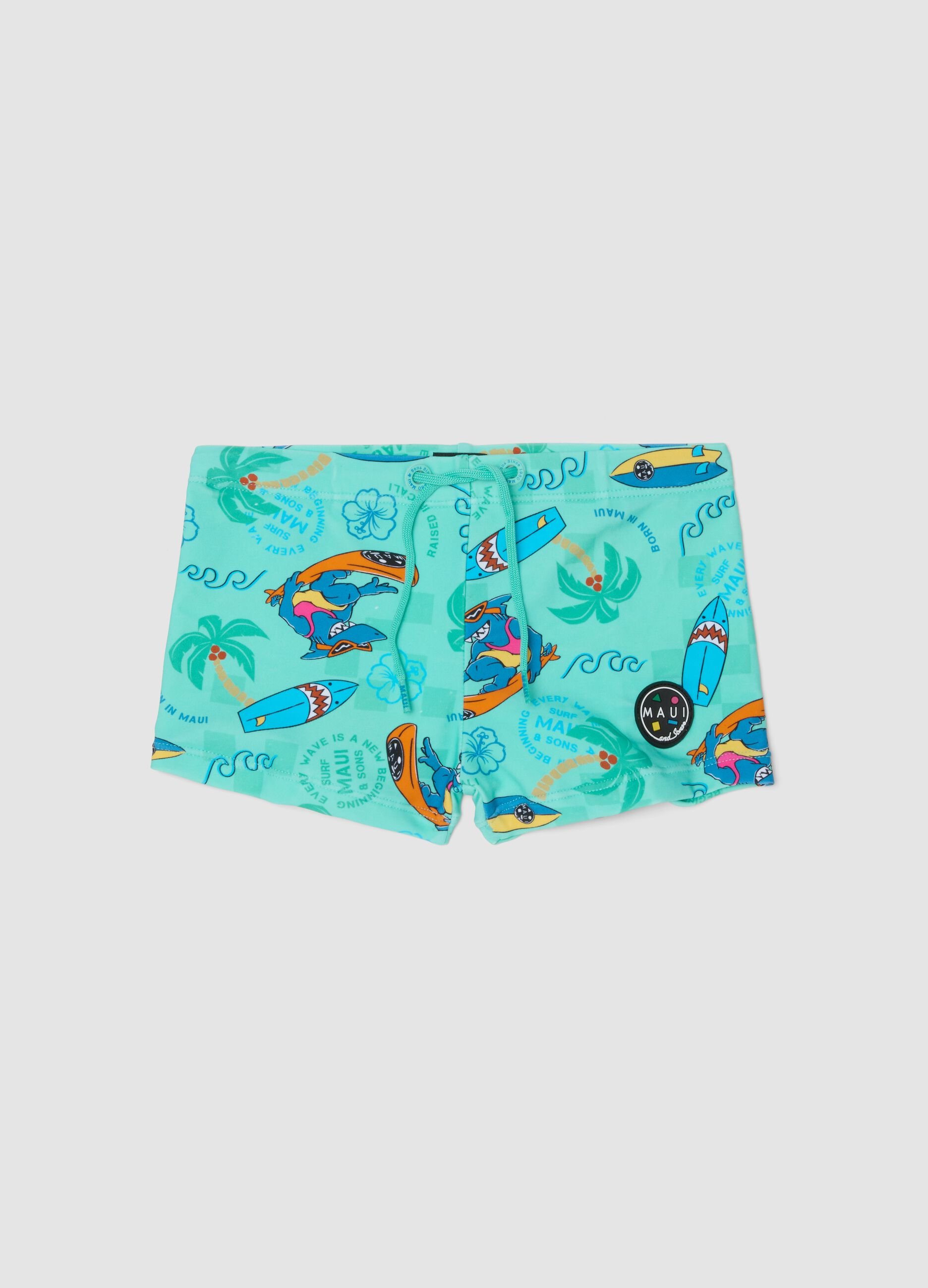 Boys&rsquo; blue stretch swim shorts with print