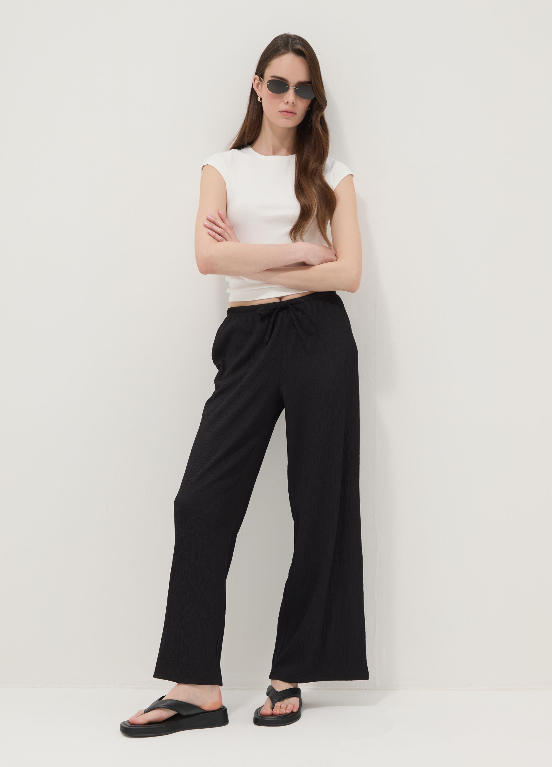 Black wide-leg jogger trousers