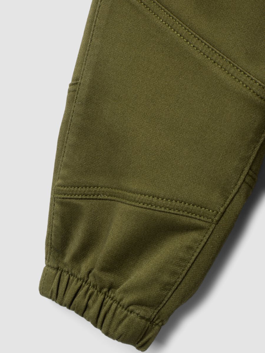 Green stretch cotton jogger trousers with drawstring, oversized fit for baby boy_3