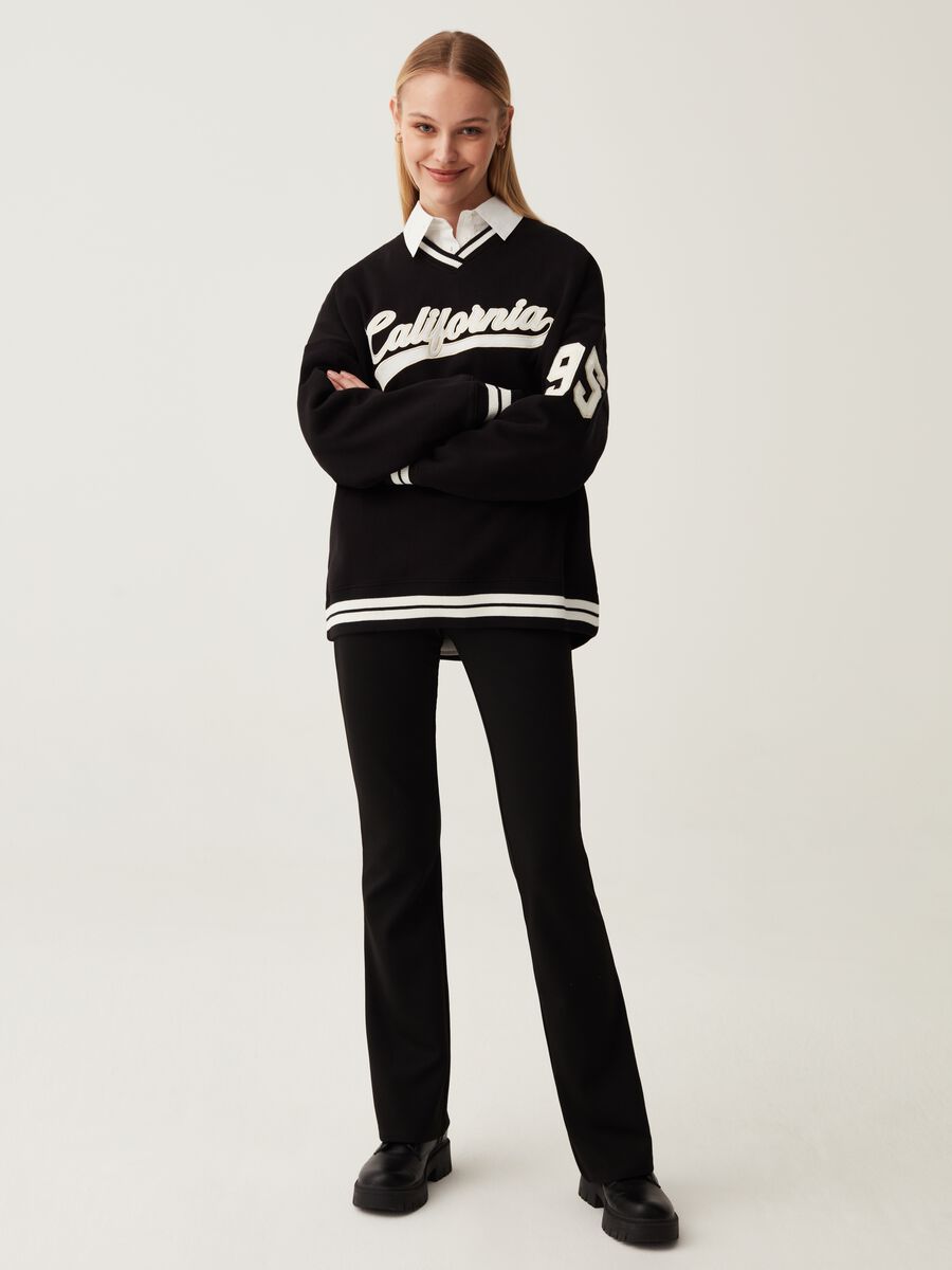 Felpa oversize con scollo a V_0