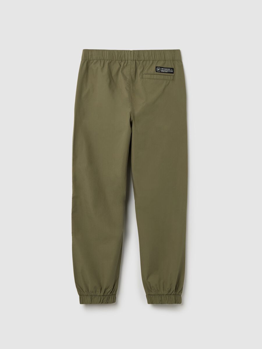 Boys’ trousers in 100% green cotton._1