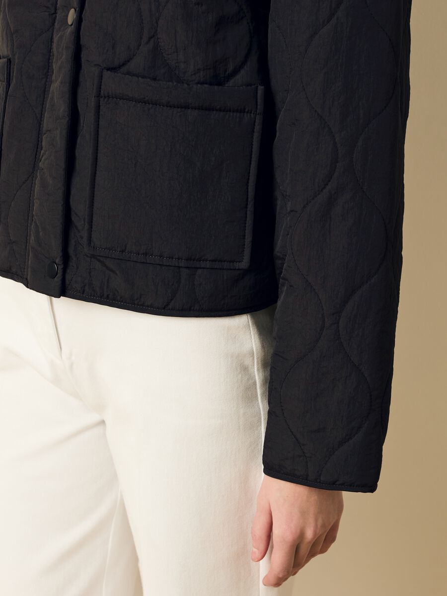 Short quilted jacket with buttons_2