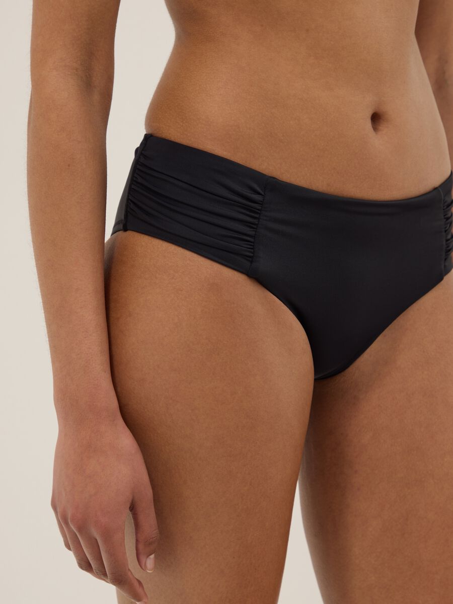 Black stretch swim briefs with side gathers_3