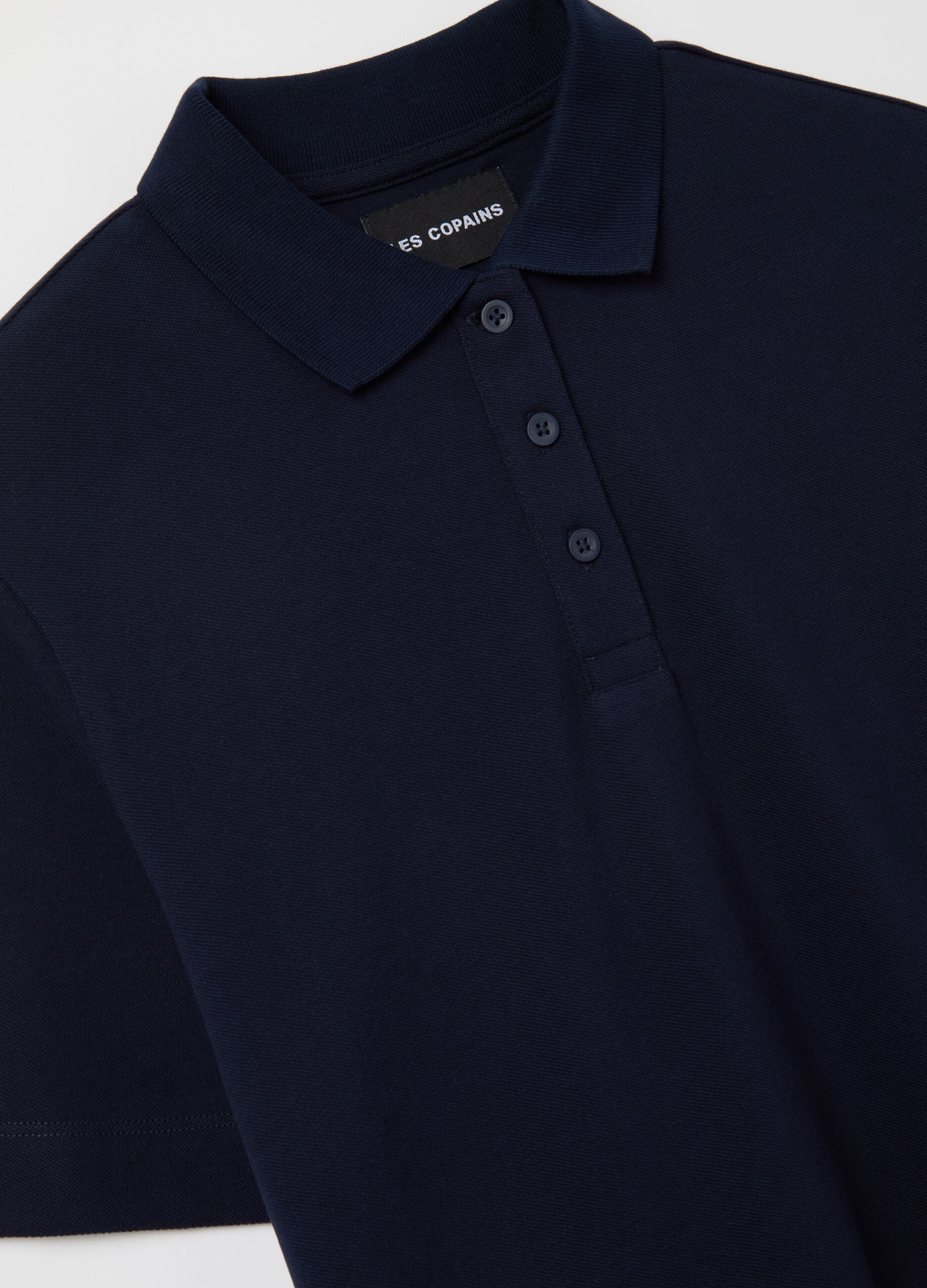 Polo shirt in solid colour piquet
