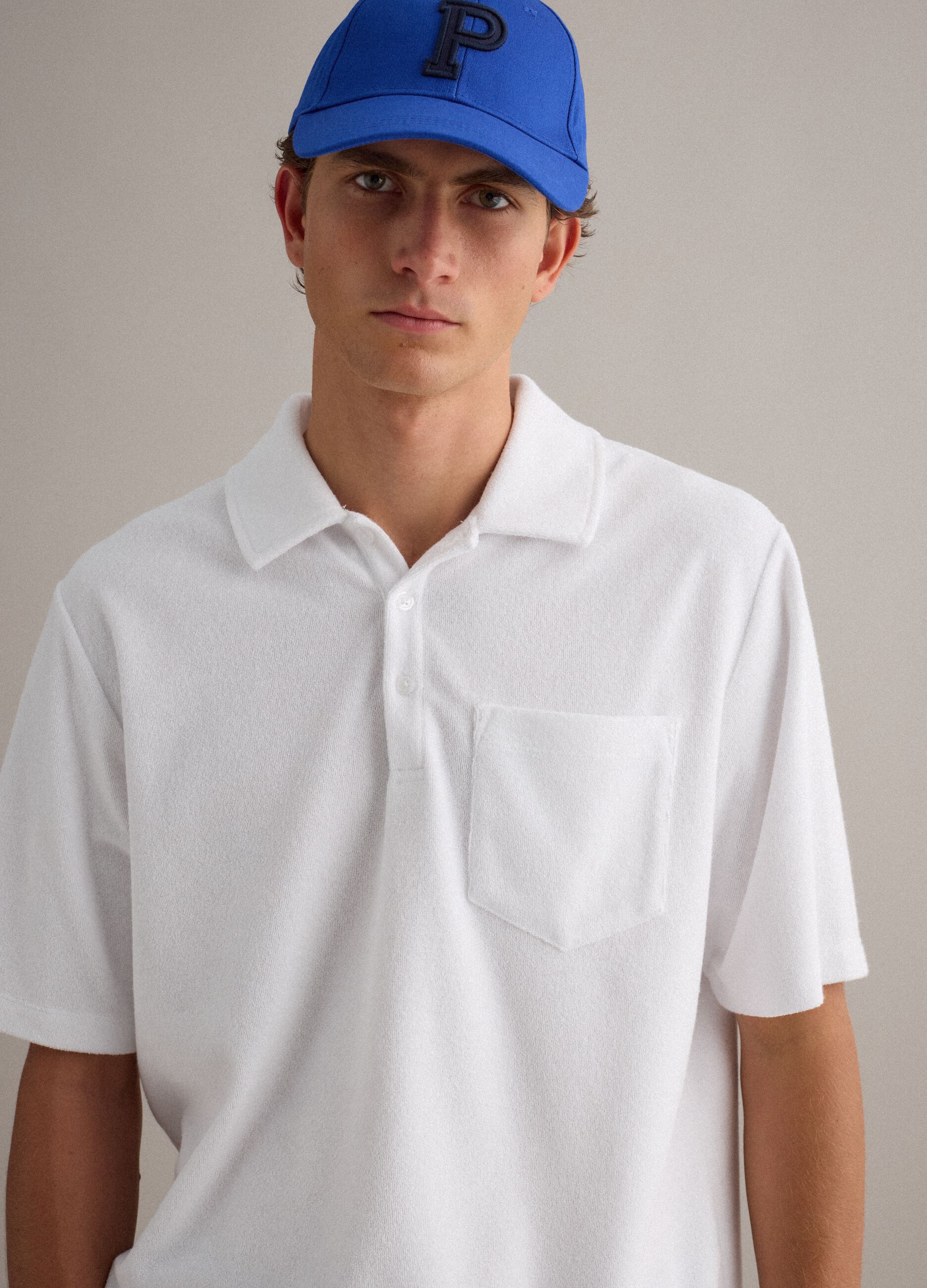 White cotton-blend polo shirt