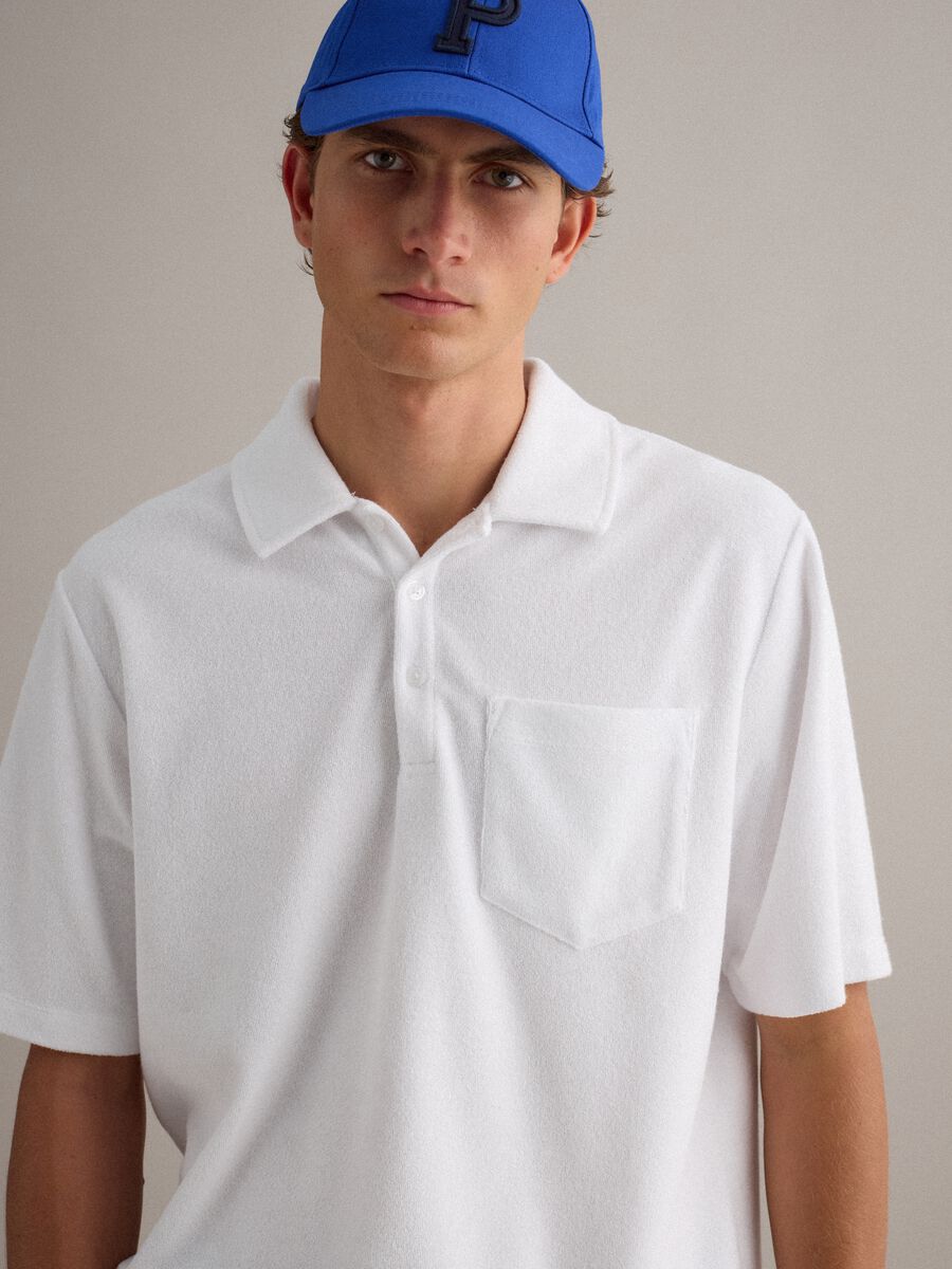 Polo bianca in misto cotone regular fit con taschino_0