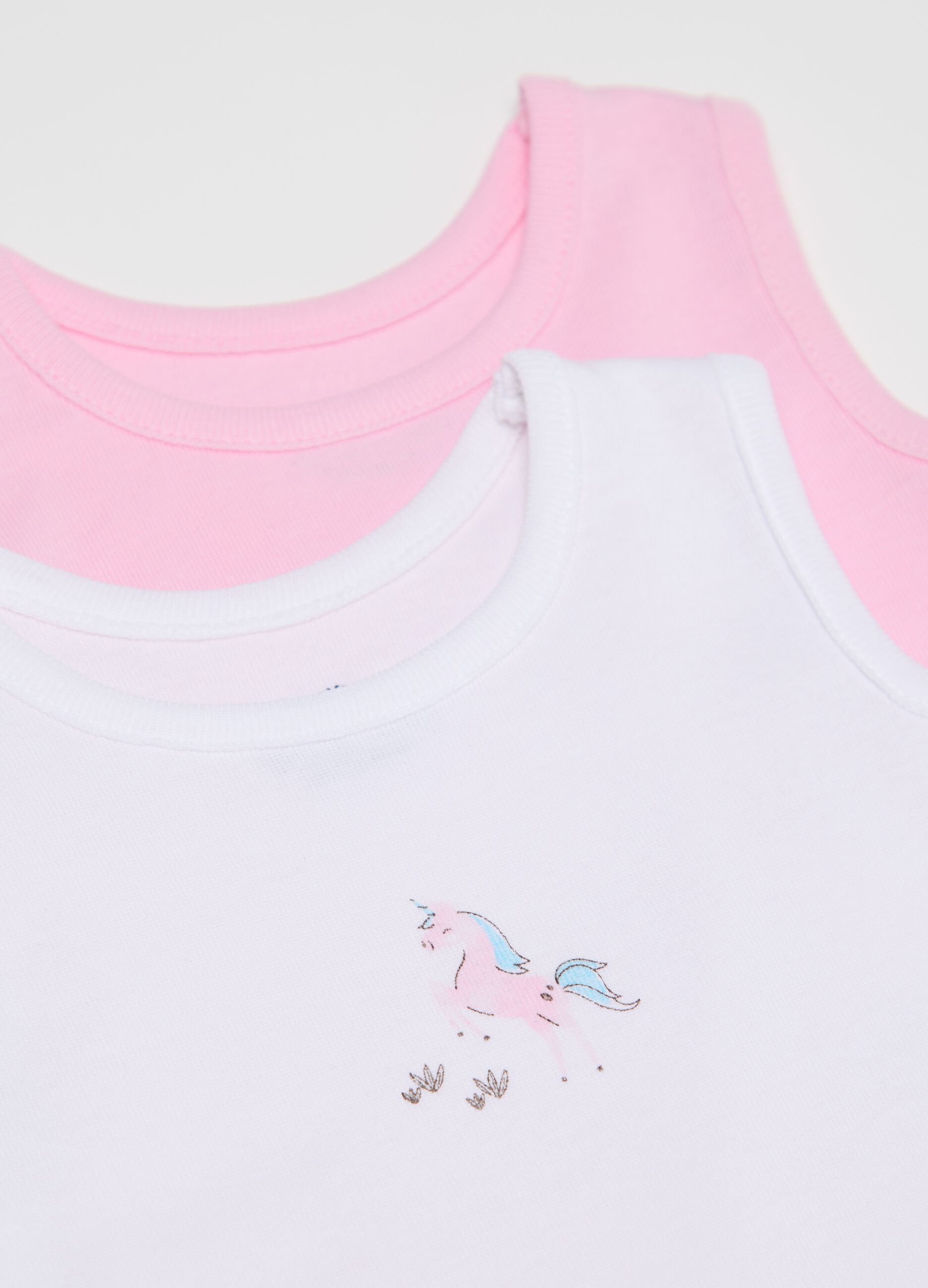 Three-pack white and pink bodysuits in organic cotton with print