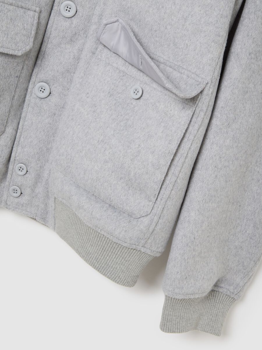 Giacca imbottita grigia regular fit con zip e bottoni_1