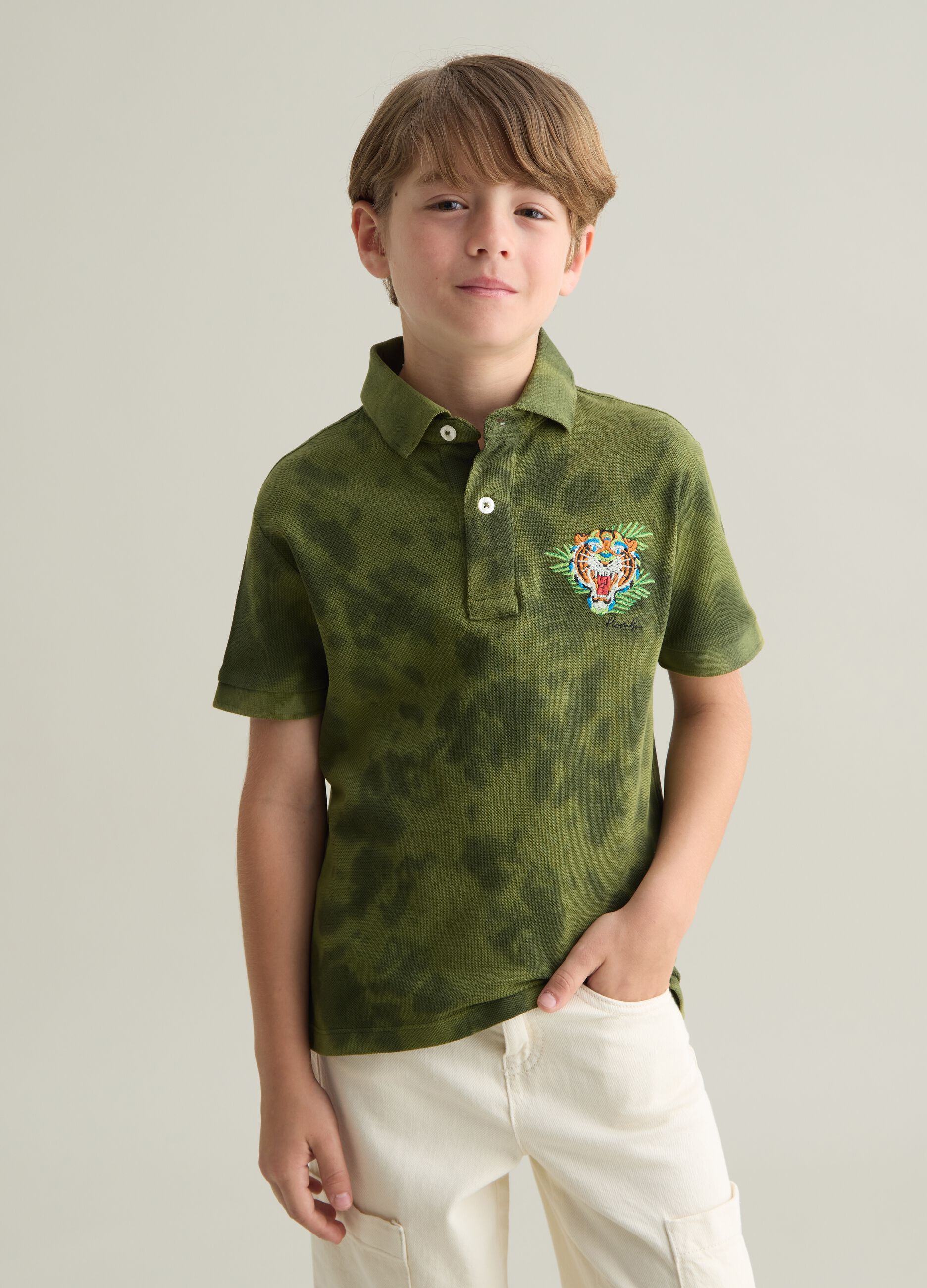 Green short sleeve cotton polo with tiger print