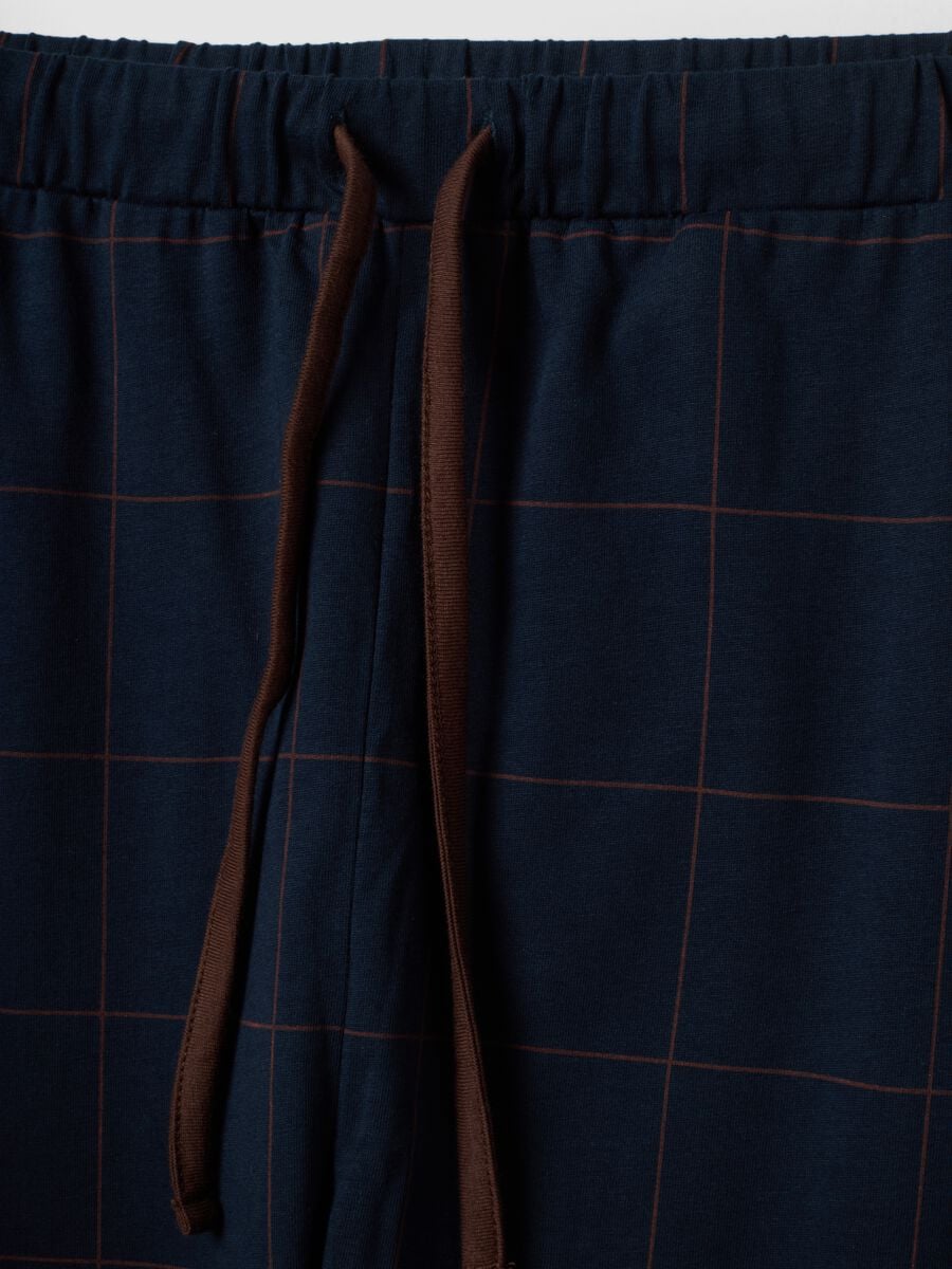 Pigiama blu in puro cotone organico con scollo a V_1