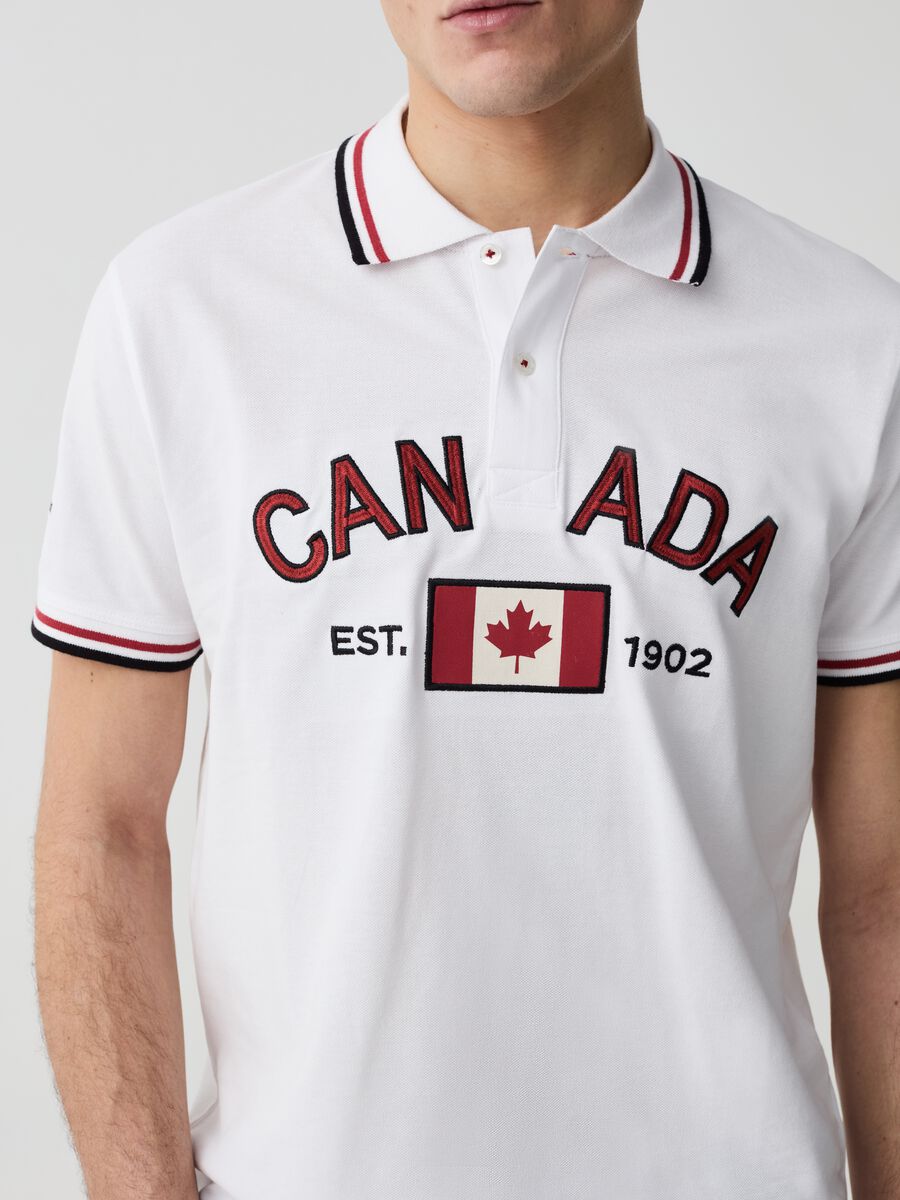 Polo shirt with striped edging and Canada Trail embroidery_1