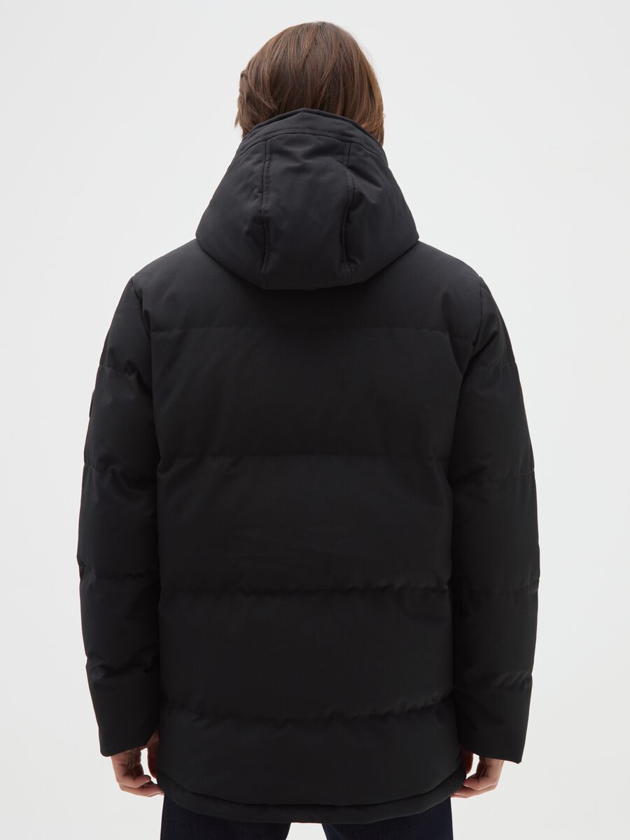Black padded regular fit jacket with hood and buttons_2