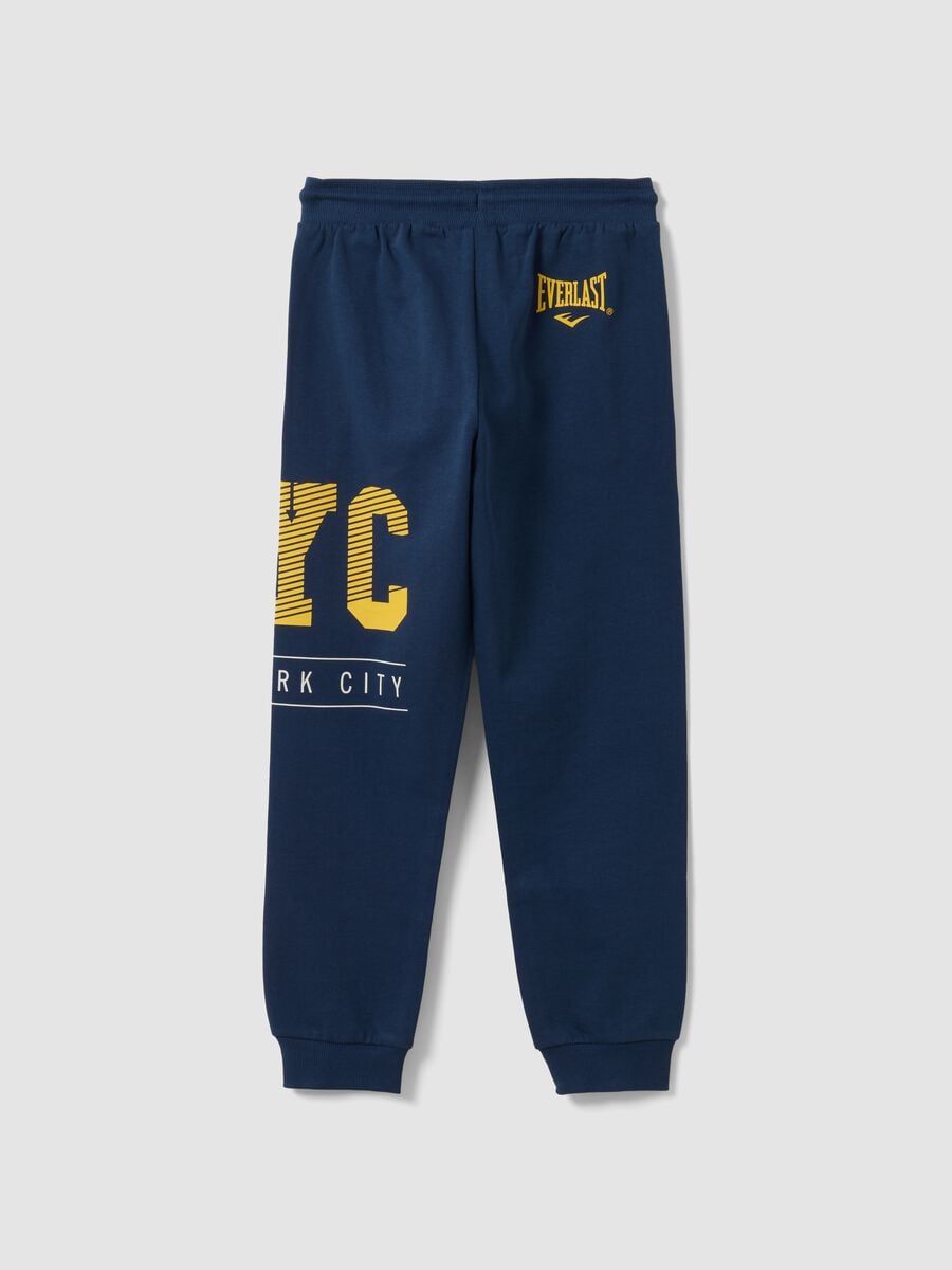 Pantaloni sportivi blu in puro cotone con stampa a contrasto per bambino_1