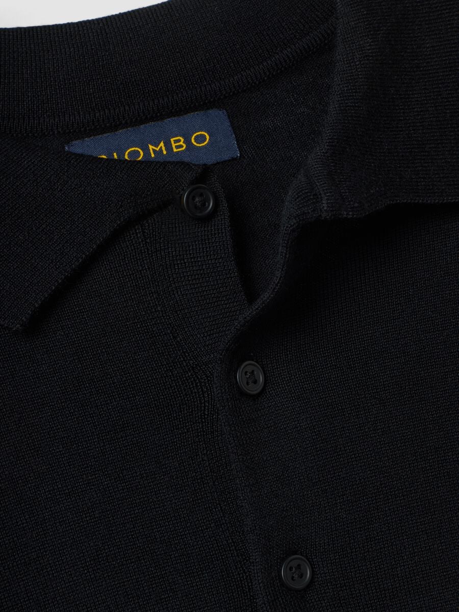 Maglia polo nera in pura lana merino con colletto polo_1