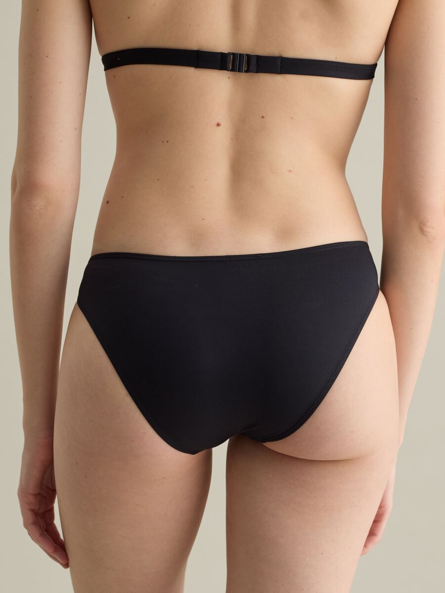 Women’s briefs in black stretch fabric with bow detail_2
