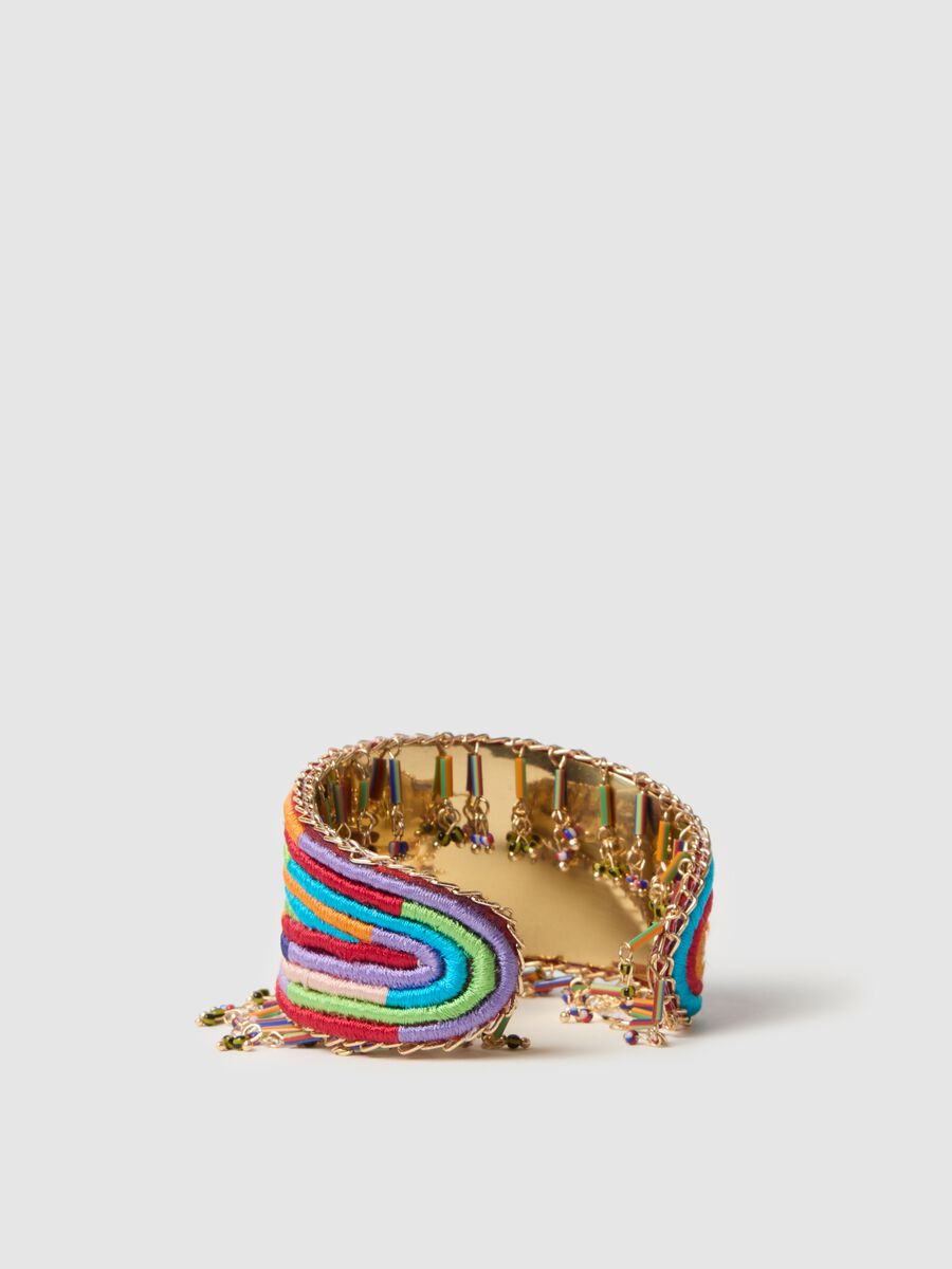 Solid bracelet with multicoloured strands and beads_1