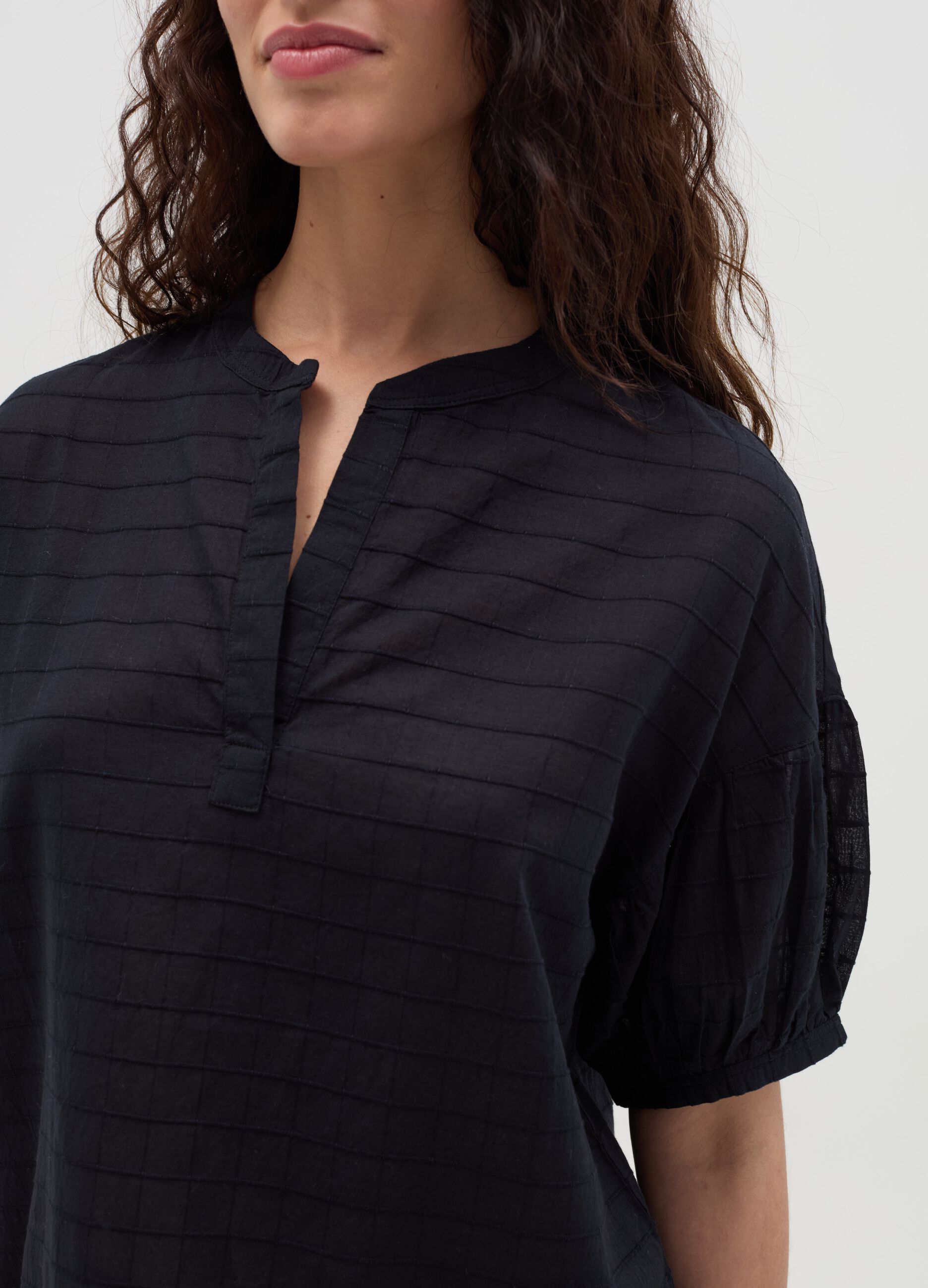 Blouse with raised stitching