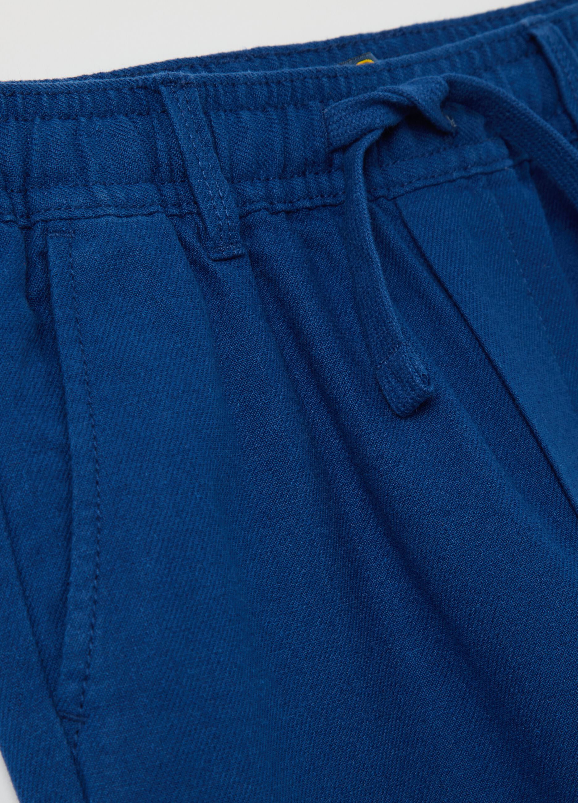 Pantaloni blu in cotone e lino con coulisse
