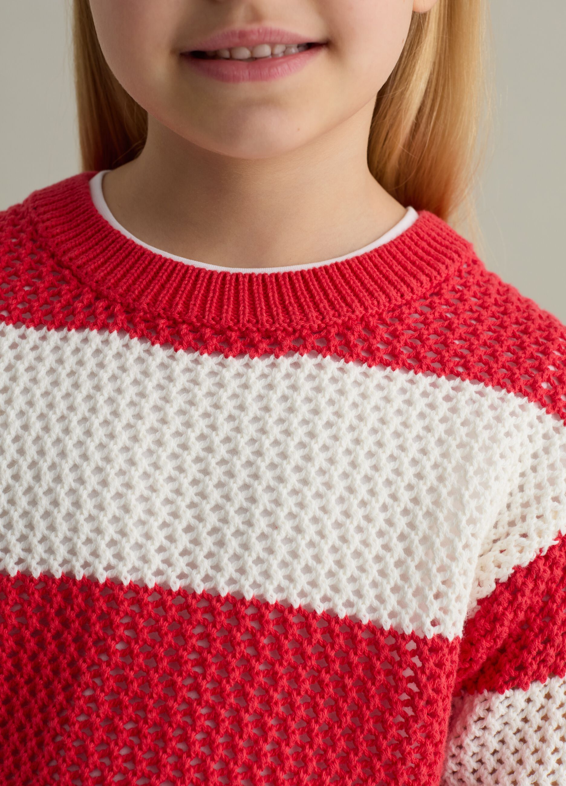 Pullover a righe con trama traforata 