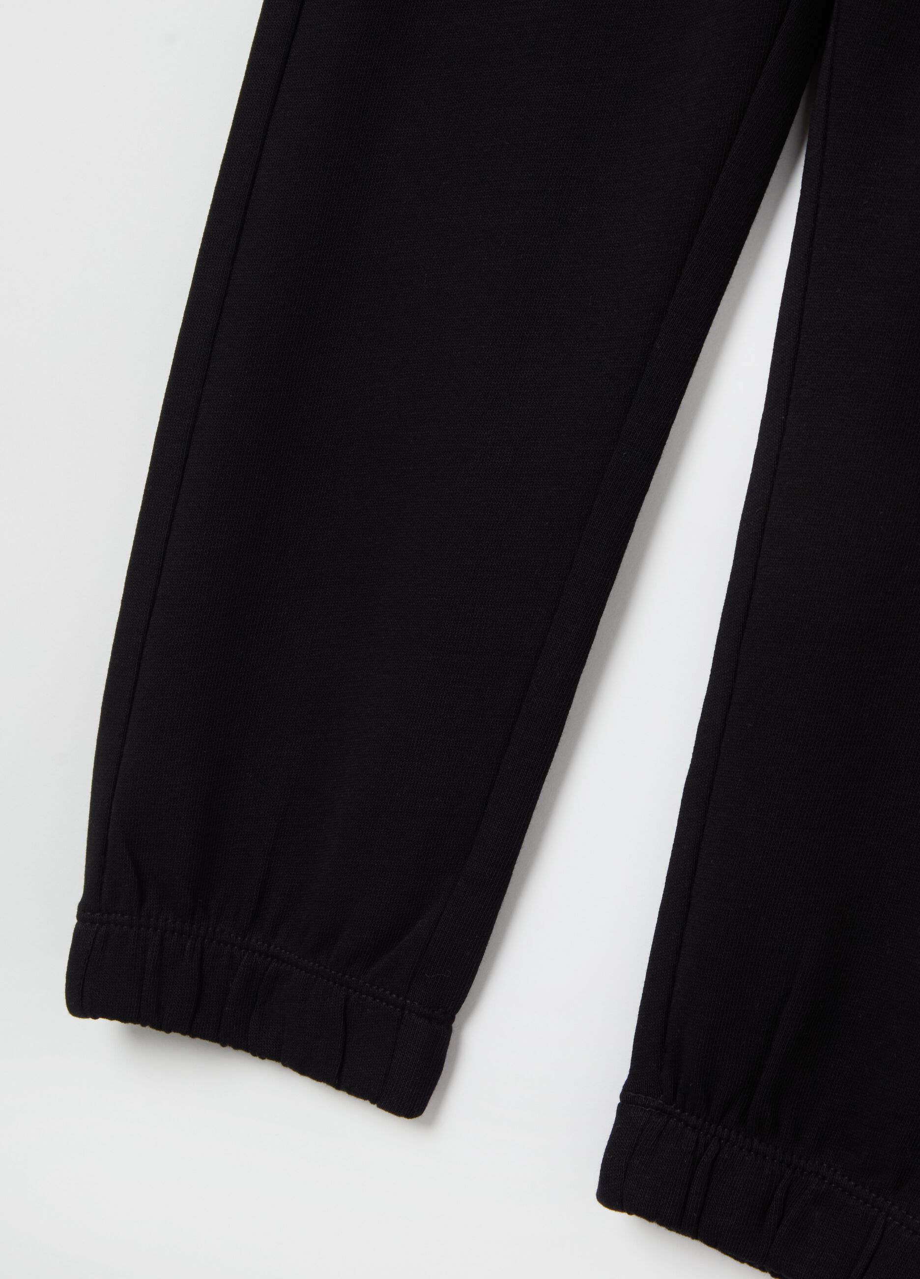 Joggers with drawstring and print